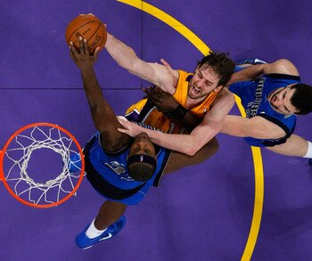 LOS ANGELES, CA - MAY 04:  Pau Gasol #16 of the Los Angeles Lakers goes up for a shot as Brendan Haywood #33 of the Dallas Mavericks goes for the block in Game Two of the Western Conference Semifinals in the 2011 NBA Playoffs at Staples Center on May 4, 2