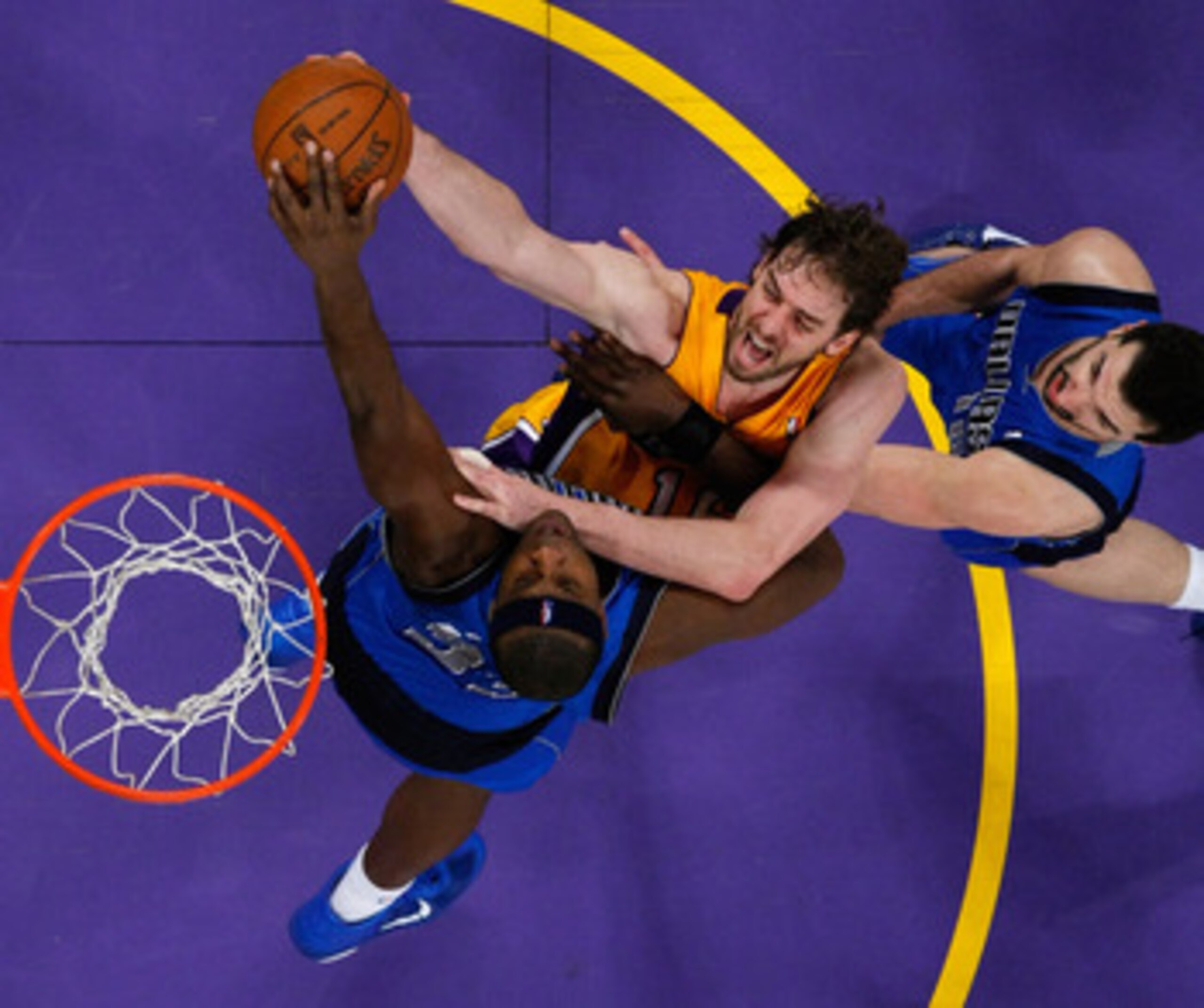 LOS ANGELES, CA - MAY 04:  Pau Gasol #16 of the Los Angeles Lakers goes up for a shot as Brendan Haywood #33 of the Dallas Mavericks goes for the block in Game Two of the Western Conference Semifinals in the 2011 NBA Playoffs at Staples Center on May 4, 2