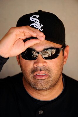 GLENDALE, AZ - MARCH 11:  Manager Ozzie Guillen #13 of the Chicago White Sox at the spring training baseball game against Chicago Cubs at Camelback Ranch on March 11, 2011 in Glendale, Arizona.  (Photo by Kevork Djansezian/Getty Images)