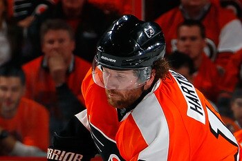 PHILADELPHIA, PA - MAY 02:  Scott Hartnell #19 of the Philadelphia Flyers passes the puck in Game Two of the Eastern Conference Semifinals against the Boston Bruins during the 2011 NHL Stanley Cup Playoffs at Wells Fargo Center on May 2, 2011 in Philadelp