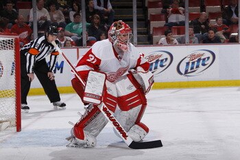 DETROIT, MI - MARCH 30:  Joey MacDonald #31 of the Detroit Red Wings watches the puck while playing against the St. Louis Blues at Joe Louis Arena on March 30, 2011 in Detroit, Michigan.  (Photo by Gregory Shamus/Getty Images)