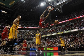 INDIANAPOLIS, IN - APRIL 23: Derrick Rose #1 of the Chicago Bulls dunks the ball against the Indiana Pacers in Game Four of the Eastern Conference Quarterfinals in the 2011 NBA Playoffs at Conseco Fieldhouse on April 23, 2011 in Indianapolis, Indiana. The