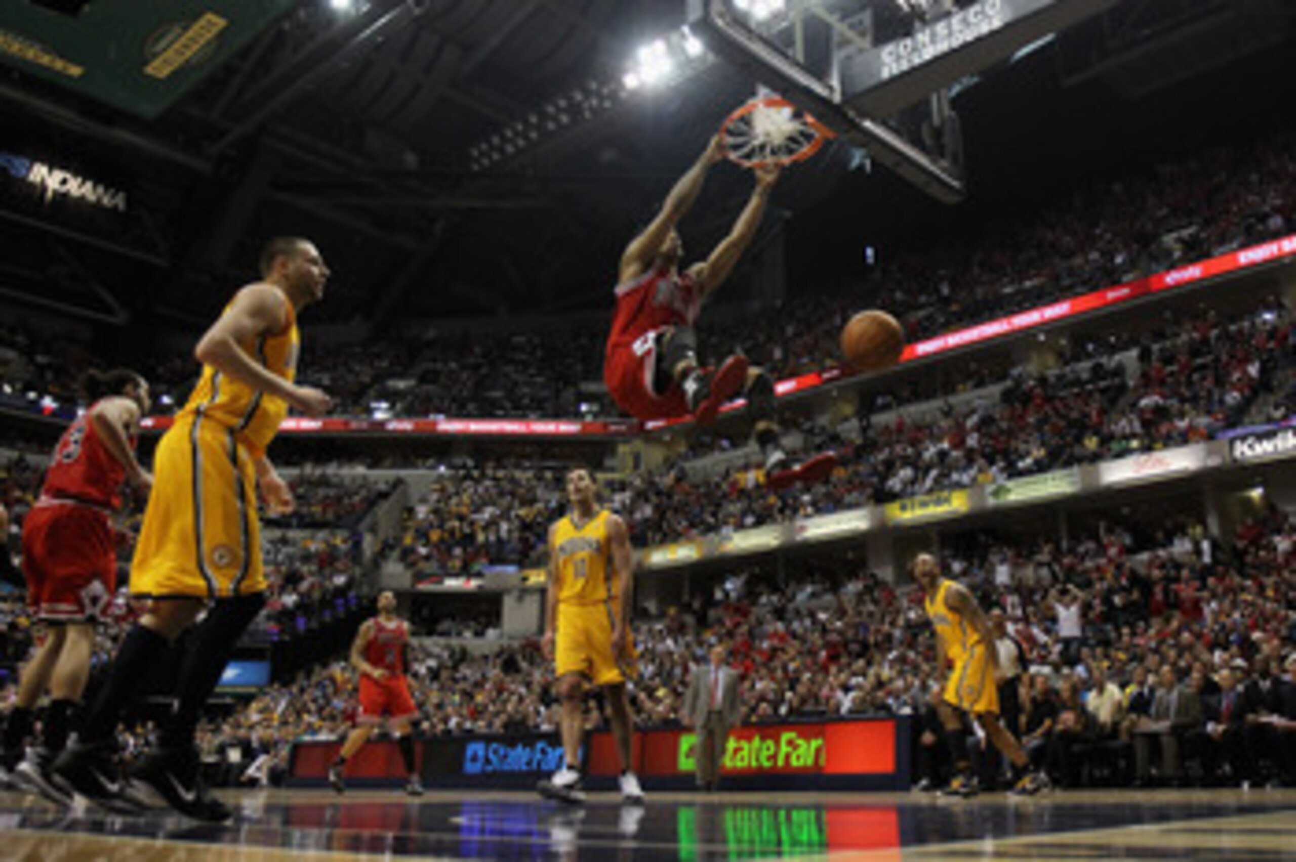 INDIANAPOLIS, IN - APRIL 23: Derrick Rose #1 of the Chicago Bulls dunks the ball against the Indiana Pacers in Game Four of the Eastern Conference Quarterfinals in the 2011 NBA Playoffs at Conseco Fieldhouse on April 23, 2011 in Indianapolis, Indiana. The