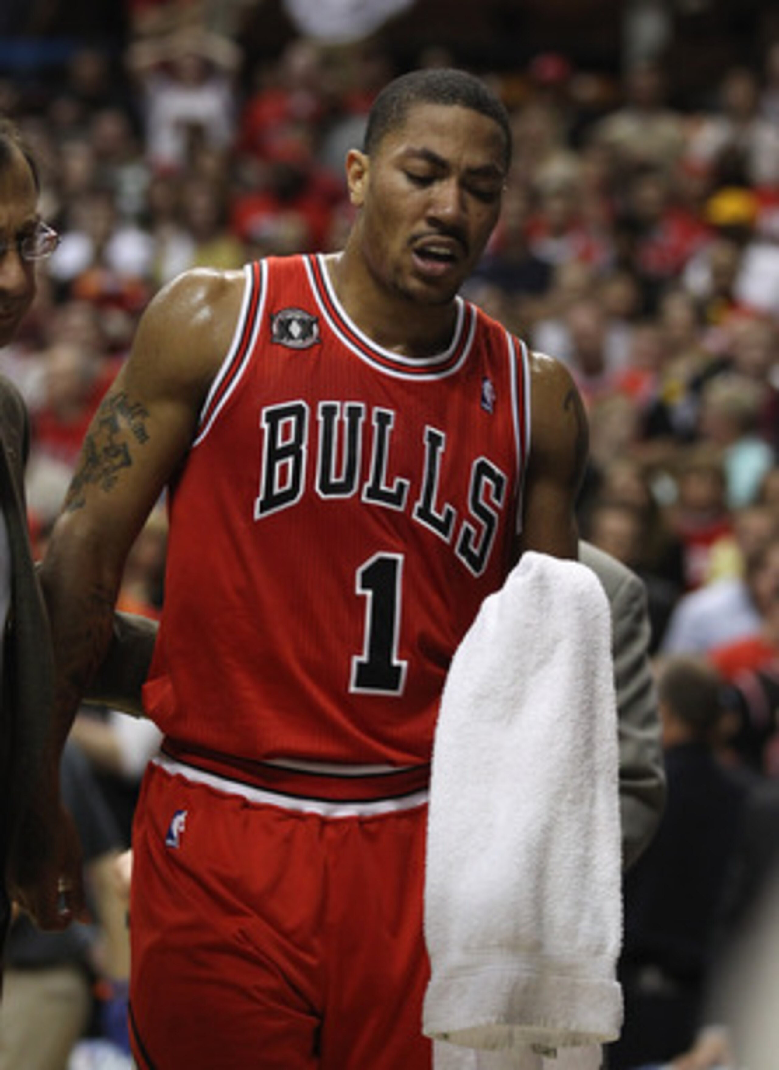 INDIANAPOLIS, IN - APRIL 23: Derrick Rose #1 of the Chicago Bulls walks off of the court after injuring his ankle against the Indiana Pacers in Game Four of the Eastern Conference Quarterfinals in the 2011 NBA Playoffs at Conseco Fieldhouse on April 23, 2