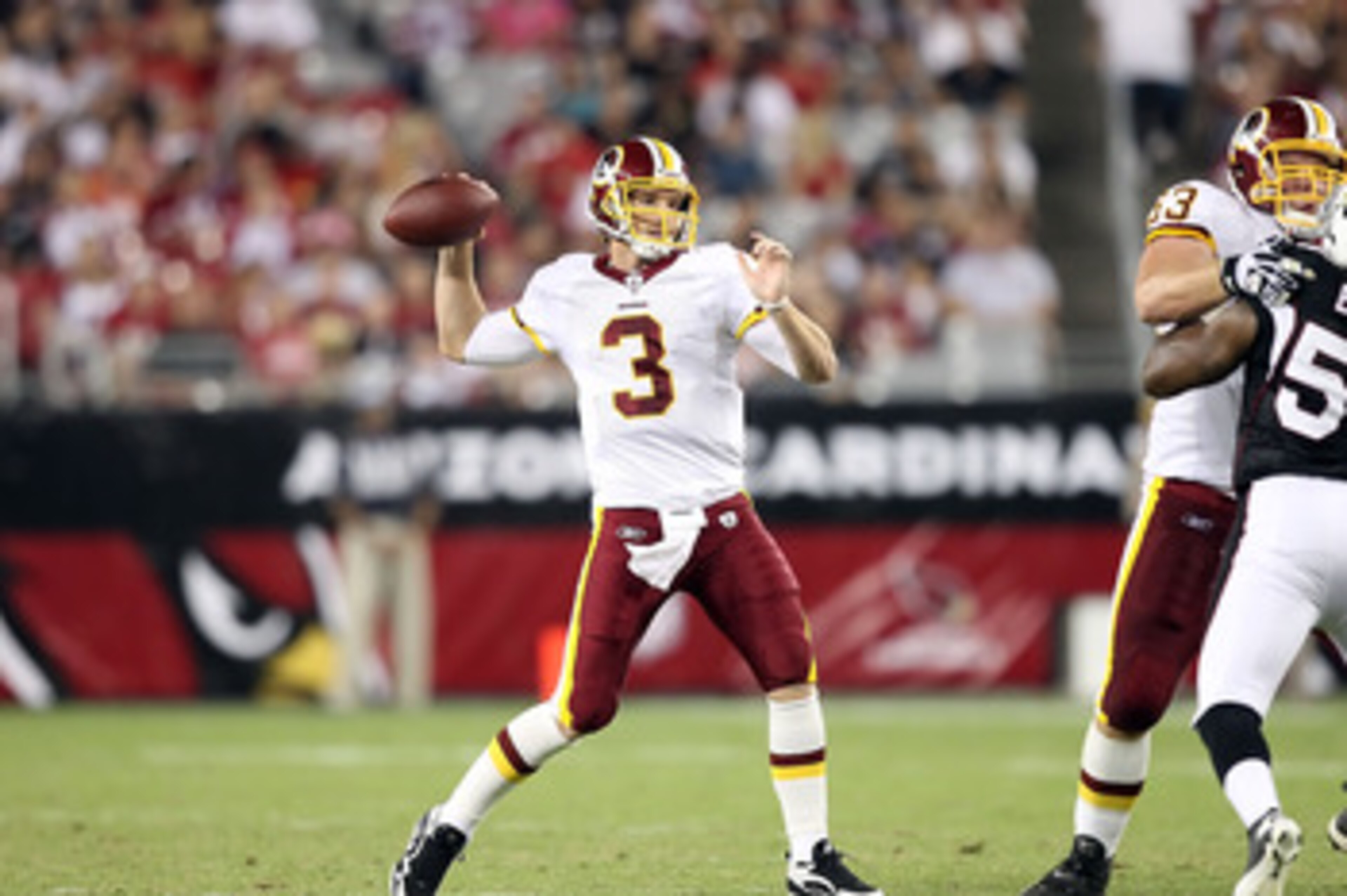 GLENDALE, AZ - SEPTEMBER 02:  Quarterback John Beck #3 of the Washington Redskins drops back to pass during preseason NFL game against the Arizona Cardinals at the University of Phoenix Stadium on September 2, 2010 in Glendale, Arizona. The Cardinals defe