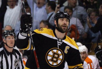 BOSTON, MA - MAY 04: Zdeno Chara #33 of the Boston Bruins celebrates teammate David Krejci's goal in the first period against the Philadelphia Flyers  in Game Three of the Eastern Conference Semifinals during the 2011 NHL Stanley Cup Playoffs at TD Garden