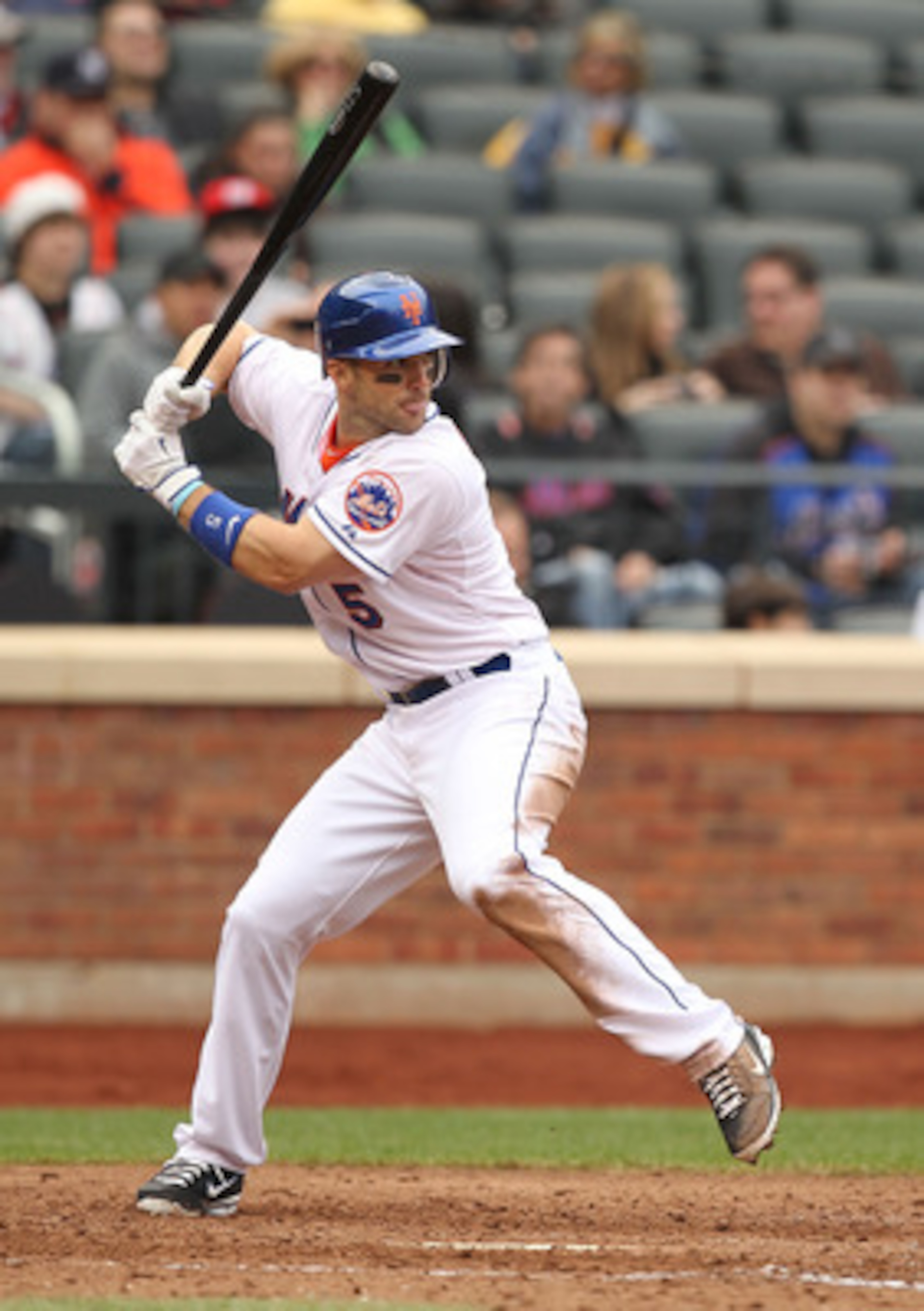 NEW YORK, NY - APRIL 10:  David Wright #5 of the New York Mets in action against the Washington Nationals during their game on April 10, 2011 at Citi Field in the Flushing neighborhood of the Queens borough of New York City.  (Photo by Al Bello/Getty Imag