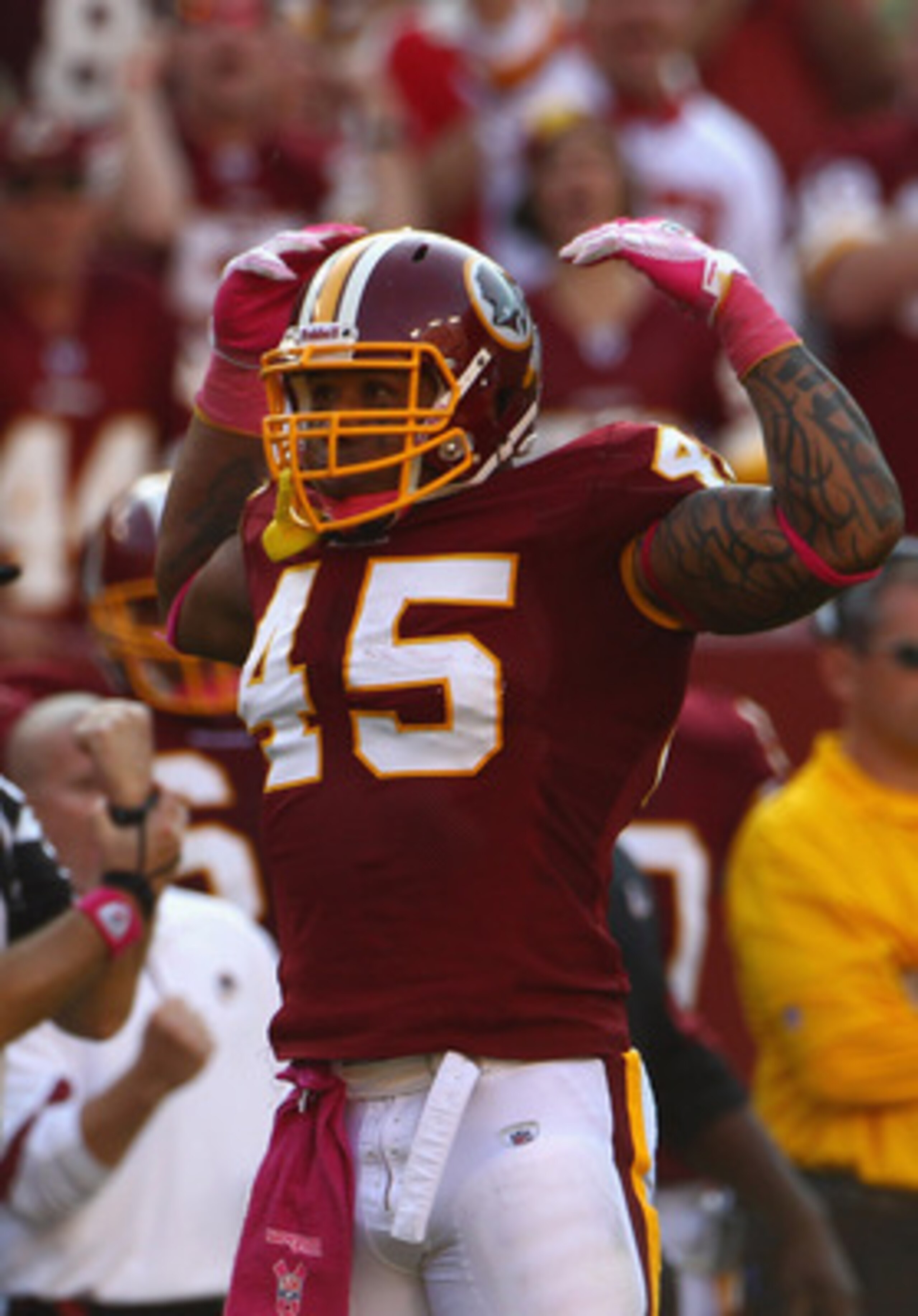 LANDOVER, MD - OCTOBER 10:  Fullback Mike Sellers #45 of the Washington Redskins flexes after officials called a penalty on a key third down play in overtime against the Green Bay Packers at FedExField on October 10, 2010 in Landover, Maryland. The Redski