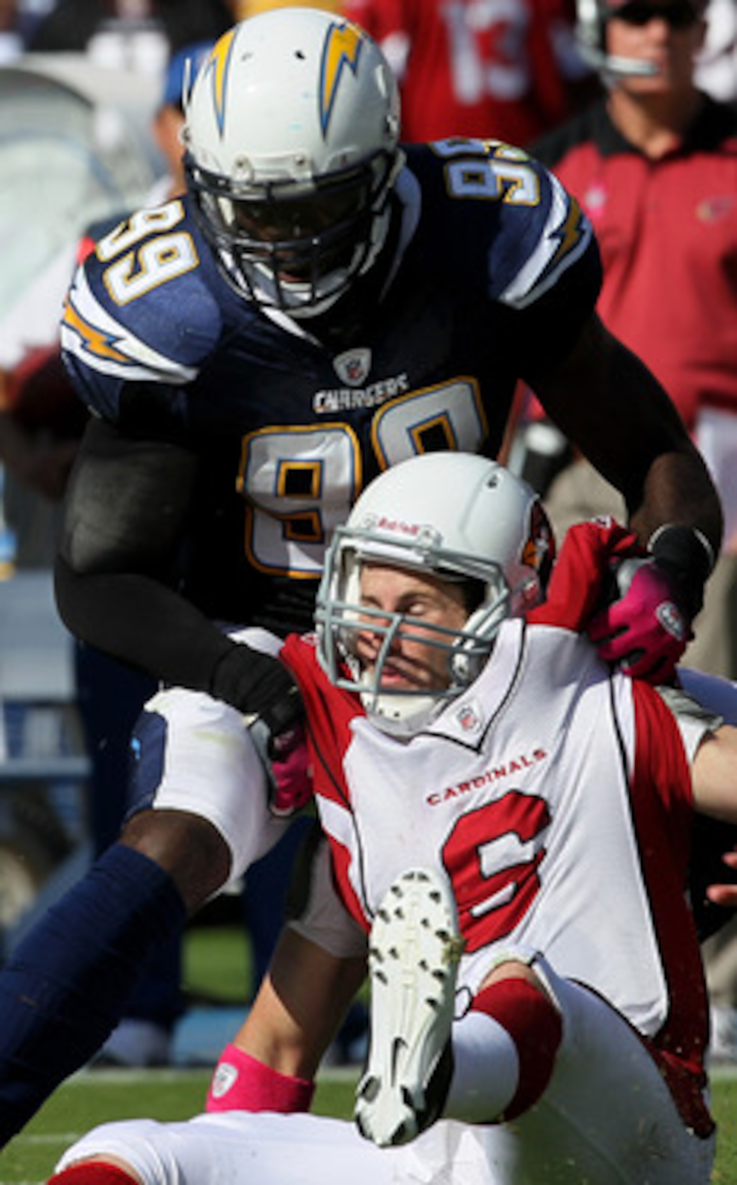 SAN DIEGO - OCTOBER 3:  Linebacker Kevin Burnett  #99 of the San Diego Chargers sacks quarterback Max Hall #3 of the Arizona Cardinals and causes a fumble at Qualcomm Stadium on October 3, 2010 in San Diego, California.   The Chargers won 41-10.  (Photo b