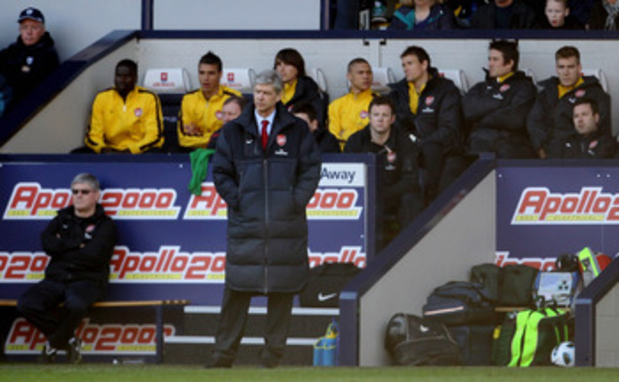 WEST BROMWICH, ENGLAND - MARCH 19: Arsene Wenger manager of Arsenal looks on from the away dugout during the Barclays Premier League match between West Bromwich Albion and Arsenal at The Hawthorns on March 19, 2011 in West Bromwich, England.  (Photo by Sc