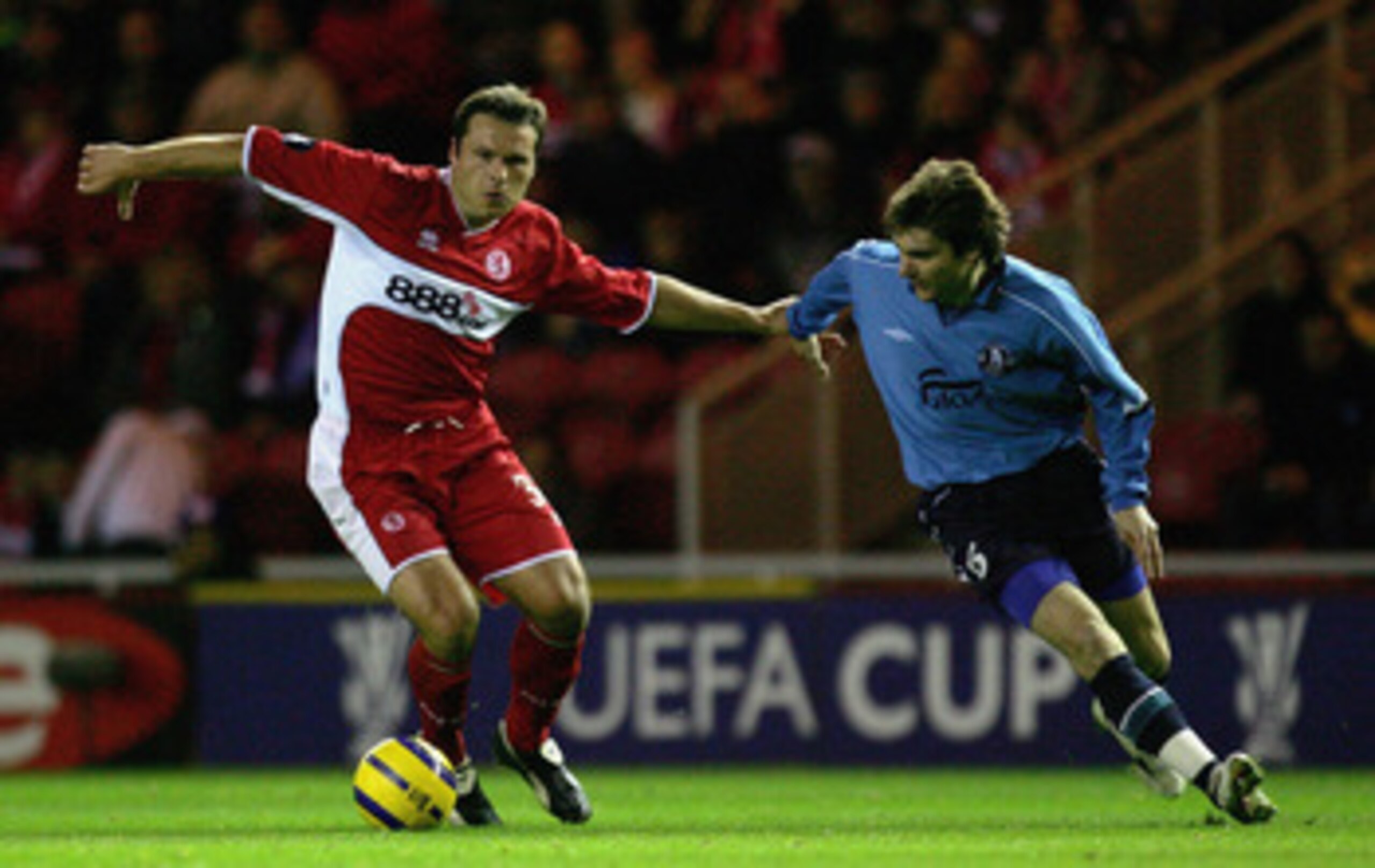 MIDDLESBROUGH, UNITED KINGDOM - NOVEMBER 03:  Mark Viduka of Middlesbrough battles with Oleg Shelayev of FC Dnipro during the UEFA Cup Group D match between Middlesbrough and Dnipro Dnipropetrovsk on November 3, 2005 at The Riverside Stadium in Middlesbro