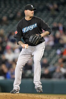 SEATTLE, WA - APRIL 13:  Relief pitcher Jon Rauch #60 of the Toronto Blue Jays pitches against the Seattle Mariners at Safeco Field on April 13, 2011 in Seattle, Washington. (Photo by Otto Greule Jr/Getty Images)