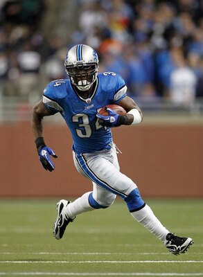 DETROIT - OCTOBER 31:  Kevin Smith #34 of the Detroit Lions runs for a first down during the fourth quarter of the game against the Washington Redskins at Ford Field on October 31, 2010 in Detroit, Michigan. The Lions defeated the Redskins 37-25.  (Photo