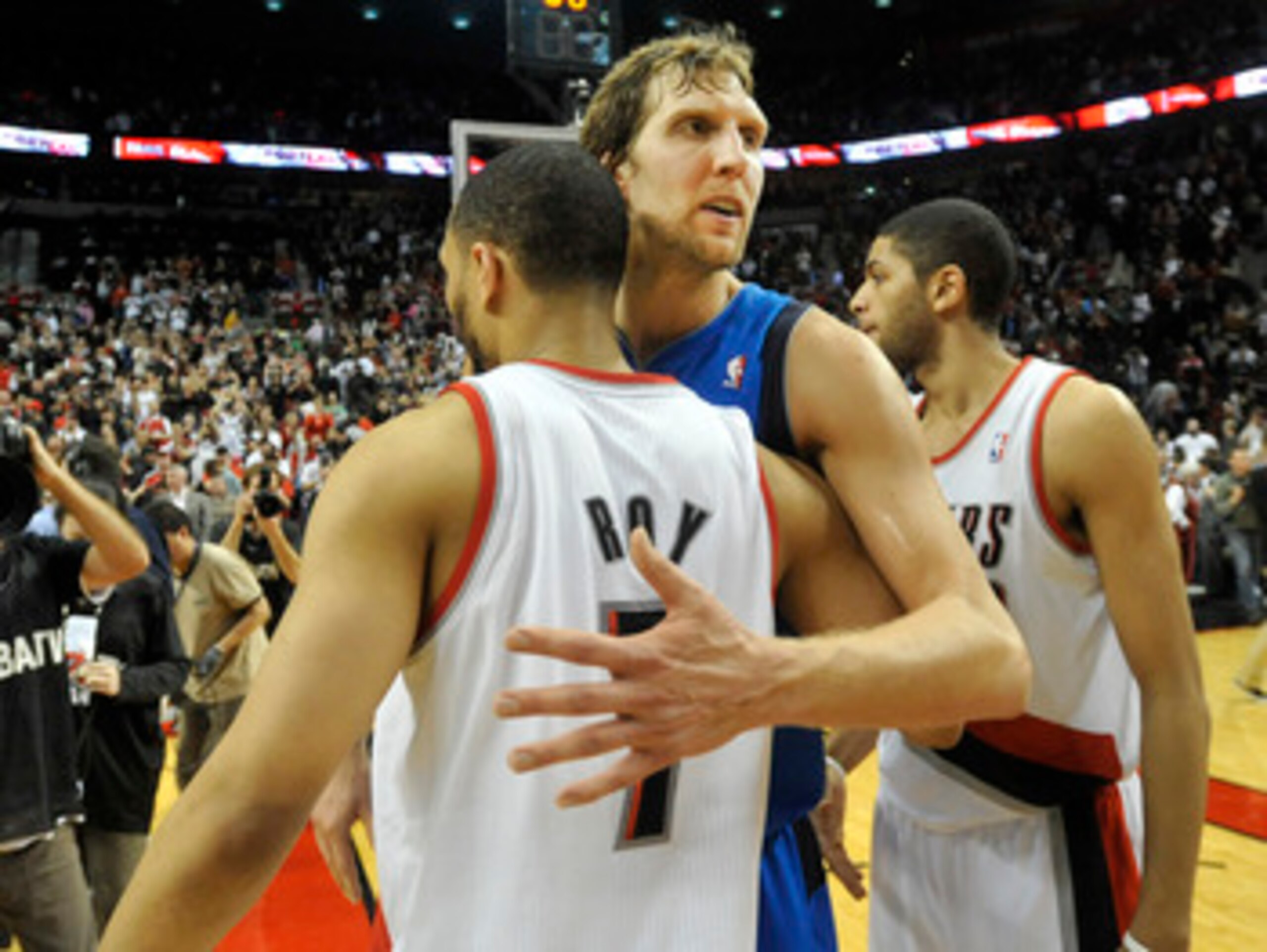 PORTLAND, OR - APRIL 28: Dirk Nowitski #41 of the Dallas Mavericks hugs Brandon Roy #7 of the Portland Trail Blazers after Game Six of the Western Conference Quartefinals against the Portland Trail Blazers in the 2011 NBA Playsoffs on April 28, 2011 at th