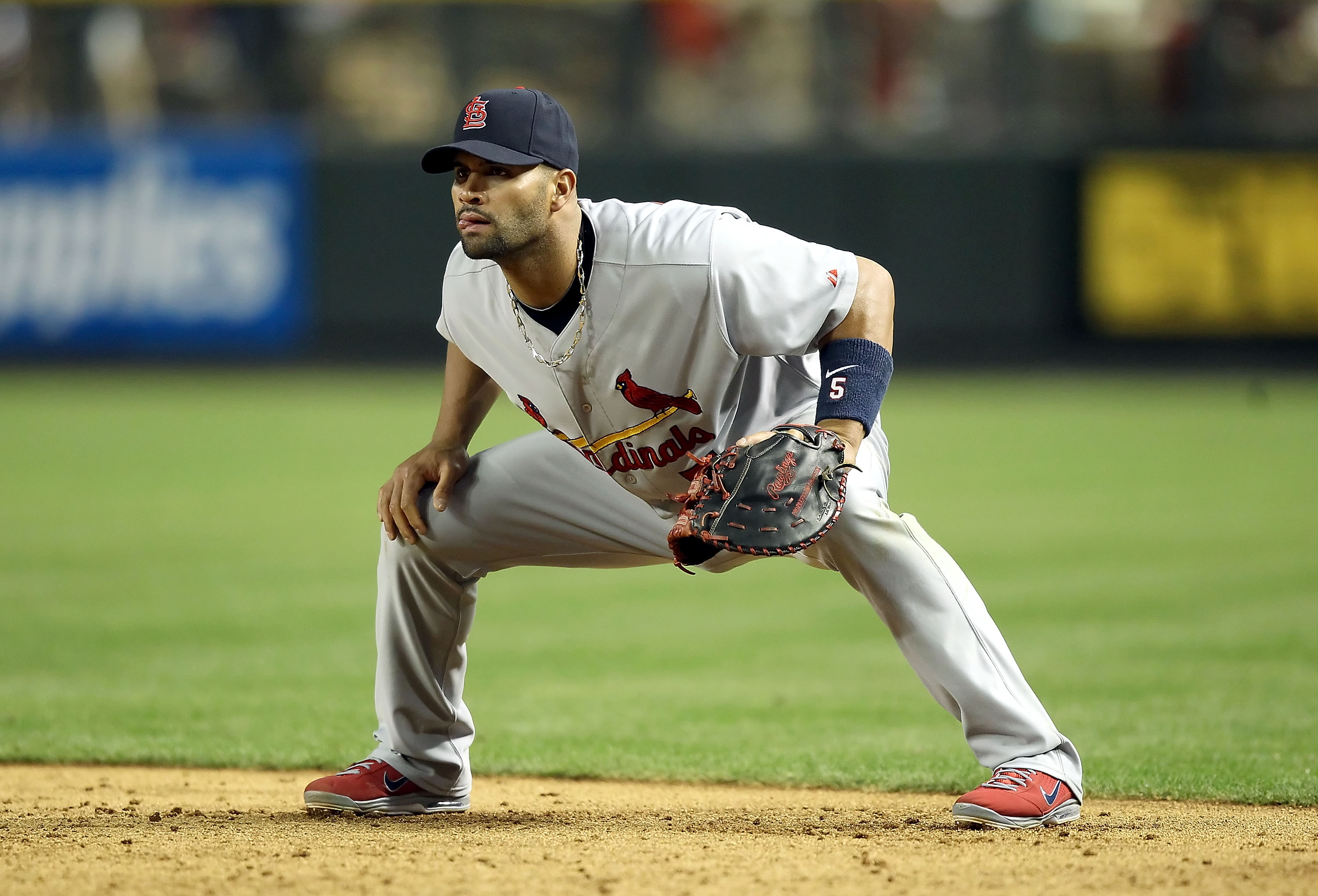 PHOENIX, AZ - APRIL 12:  Infielder Albert Pujols #5 of the St. Louis Cardinals in action during the Major League Baseball game against the Arizona Diamondbacks at Chase Field on April 12, 2011 in Phoenix, Arizona. The Diamondbacks defeated the Cardinals 1