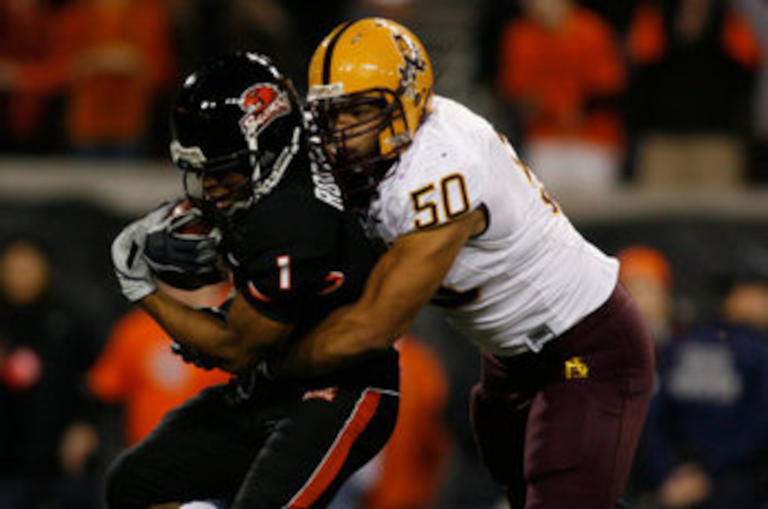 Lawrence Guy (#50 in white)