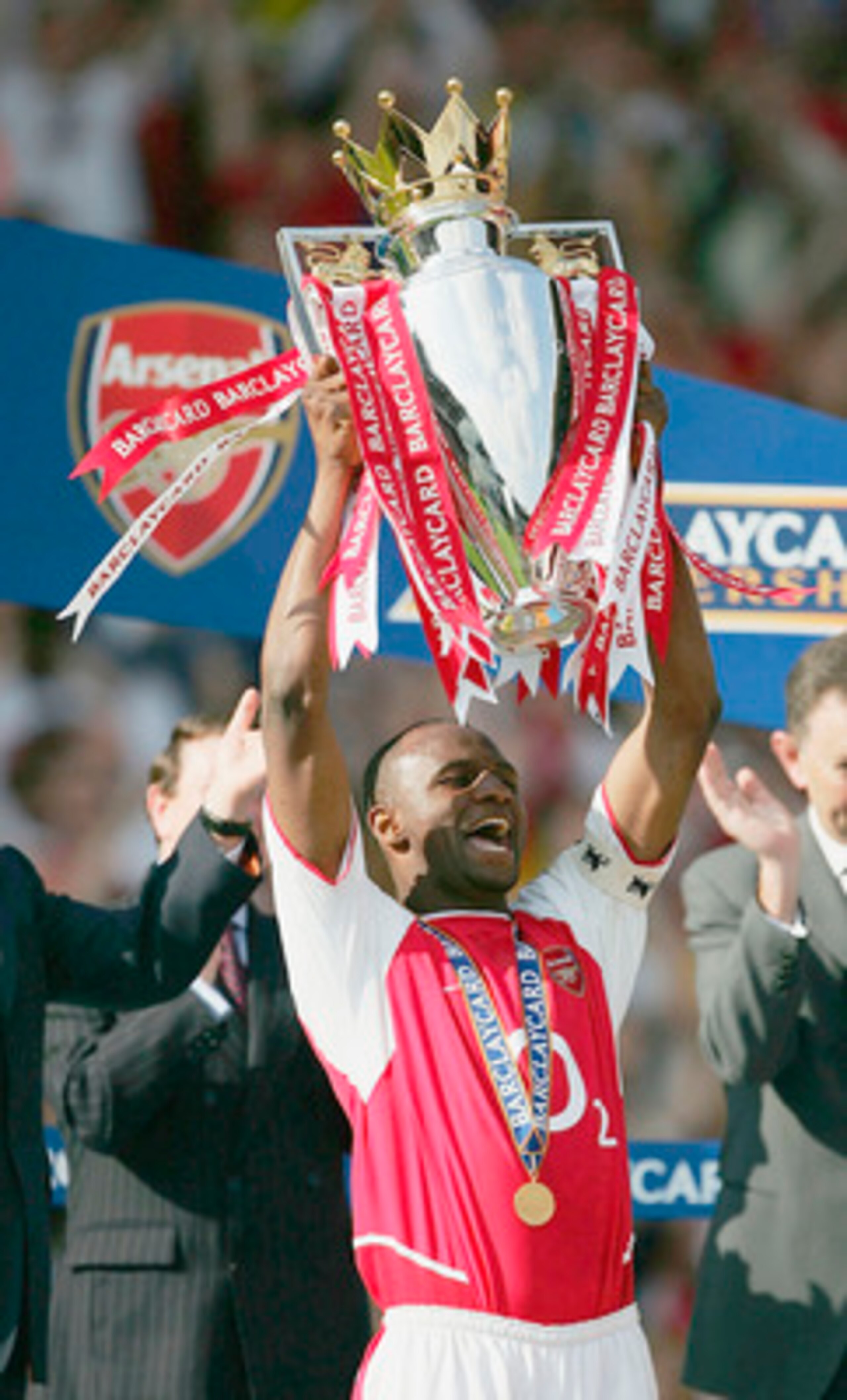 HIGHBURY, LONDON - MAY 15:  Captain Patrick Vieira of Arsenal lifts the Premiership trophy during the FA Barclaycard Premiership match between Arsenal and Leicester City at Highbury on May 15, 2004 in London. (Photo by Clive Mason/Getty Images)