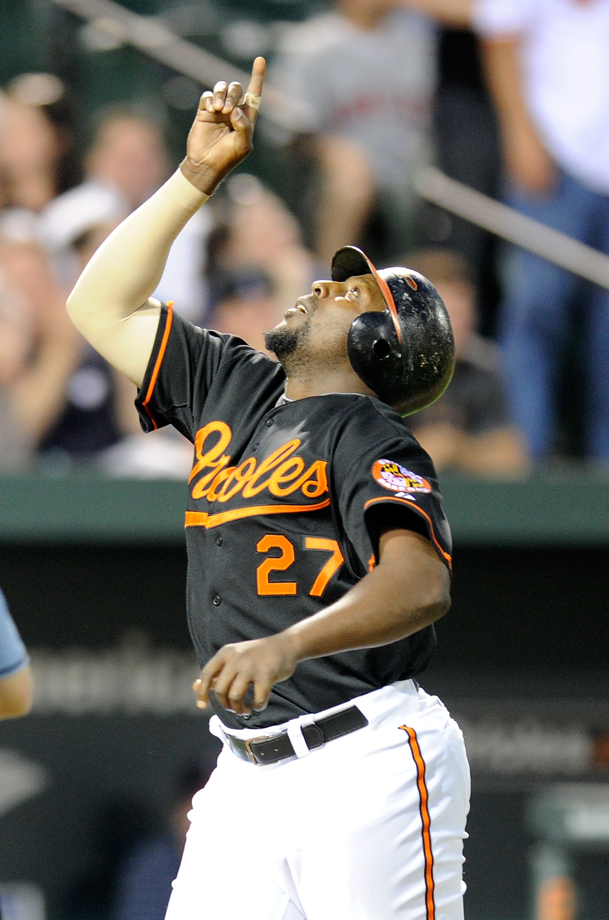 BALTIMORE, MD - APRIL 20:  Vladimir Guerrero #27 of the Baltimore Orioles celebrates after hitting a home run in the third inning against the Minnesota Twins at Oriole Park at Camden Yards on April 20, 2011 in Baltimore, Maryland.  (Photo by Greg Fiume/Ge