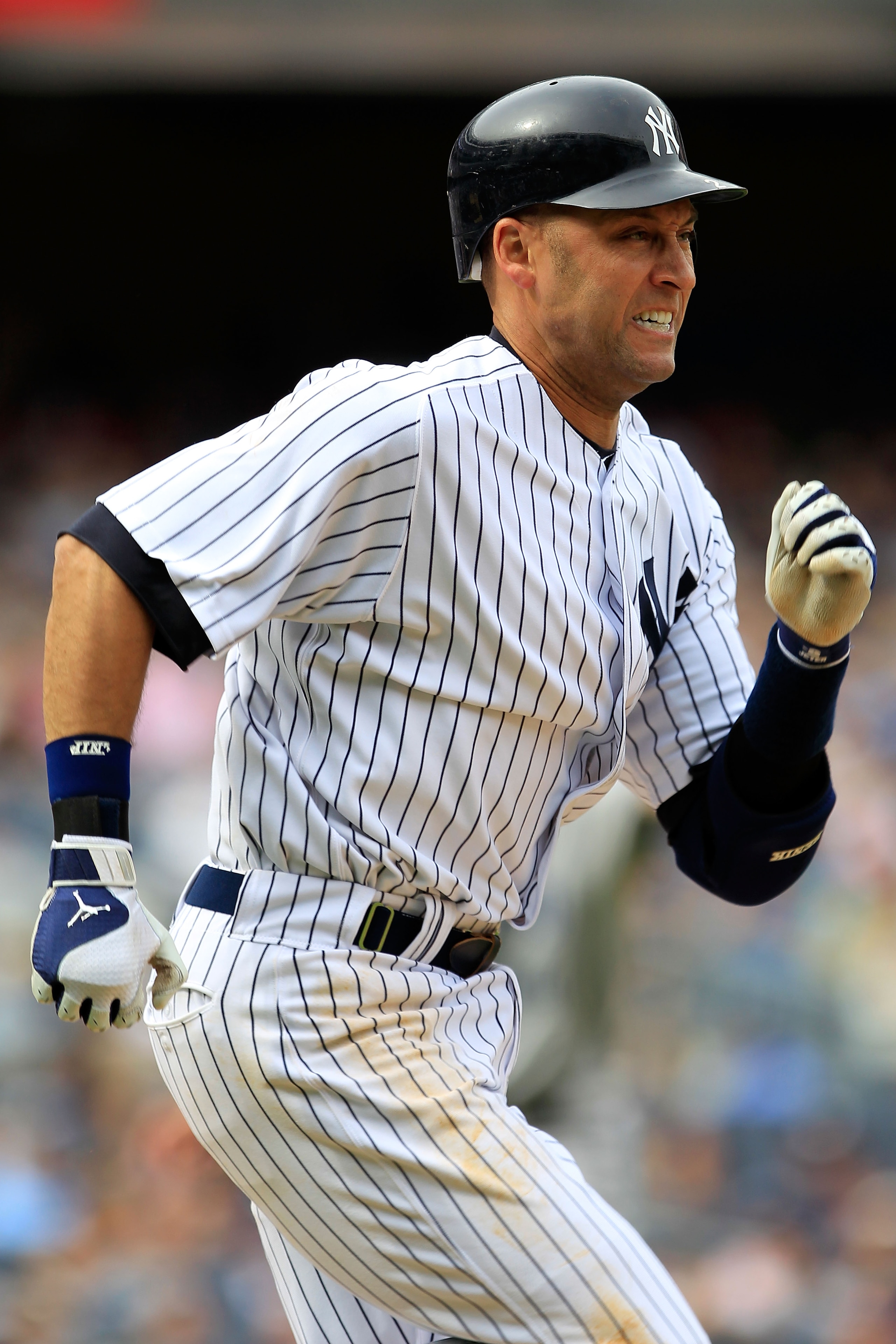 NEW YORK, NY - MAY 01: Derek Jeter #2 of the New York Yankees runs to first base against the Toronto Blue Jays at Yankee Stadium on May 1, 2011 in the Bronx borough of New York City. The Yankees defeated the  Blue Jays 5-2.  (Photo by Chris Trotman/Getty
