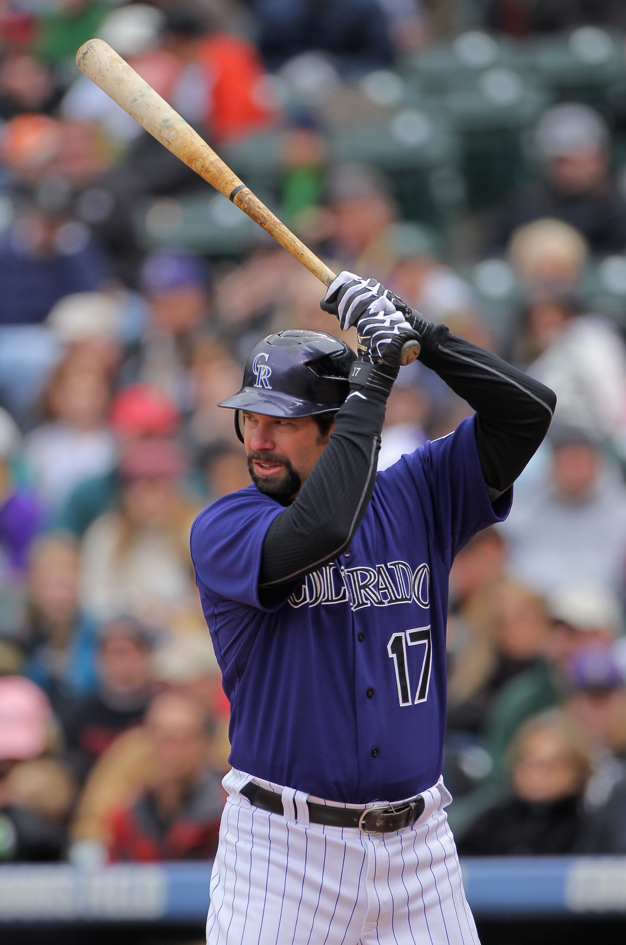DENVER, CO - MAY 01:  First baseman Todd Helton #17 of the Colorado Rockies takes an at bat against the Pittsburgh Pirates at Coors Field on May 1, 2011 in Denver, Colorado. The Pirates defeated the Rockies 8-4.  (Photo by Doug Pensinger/Getty Images)