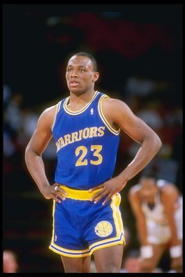 1989-1990:  Guard Mitch Richmond of the Golden State Warriors looks on during a basketball game. Mandatory Credit: Tim de Frisco  /Allsport
