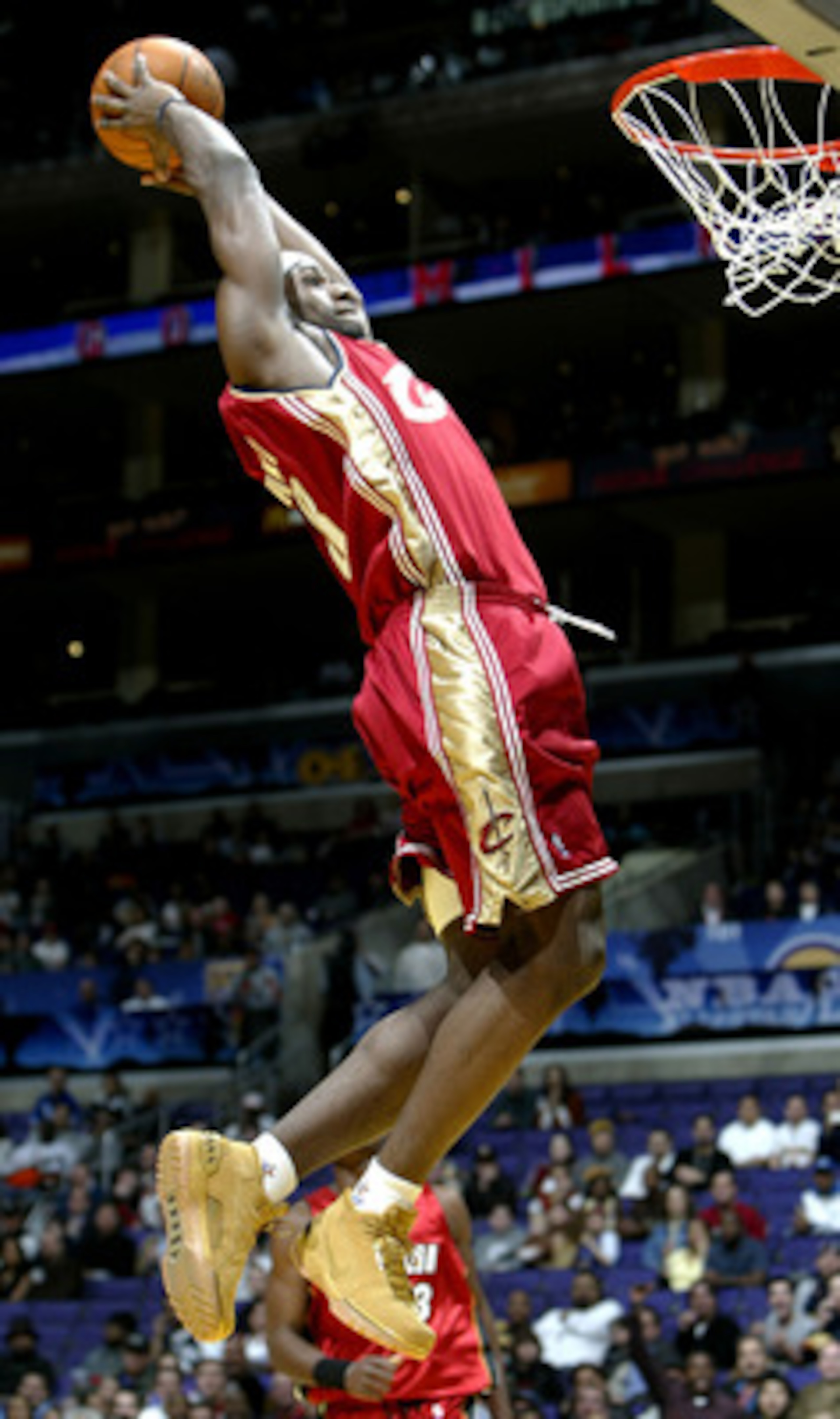 LOS ANGELES - FEBRUARY 13:  LeBron James #23 from the Cleveland Cavaliers of the Rookie Team goes up for a dunk during the Got Milk? Rookie Challenge, part of the 53rd NBA All-Star weekend at the Staples Center on February 13, 2004 in Los Angeles, Califor
