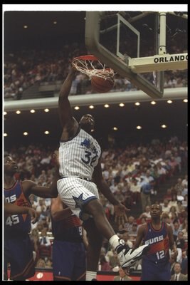 24 Oct 1994:  Center Shaquille O''Neal of the Orlando Magic sinks the ball during a game against the Phoenix Suns at the Orlando Arena in Orlando, Florida.  The Suns won the game, 135-129. Mandatory Credit: Andy Lyons  /Allsport Mandatory Credit: Andy Lyo