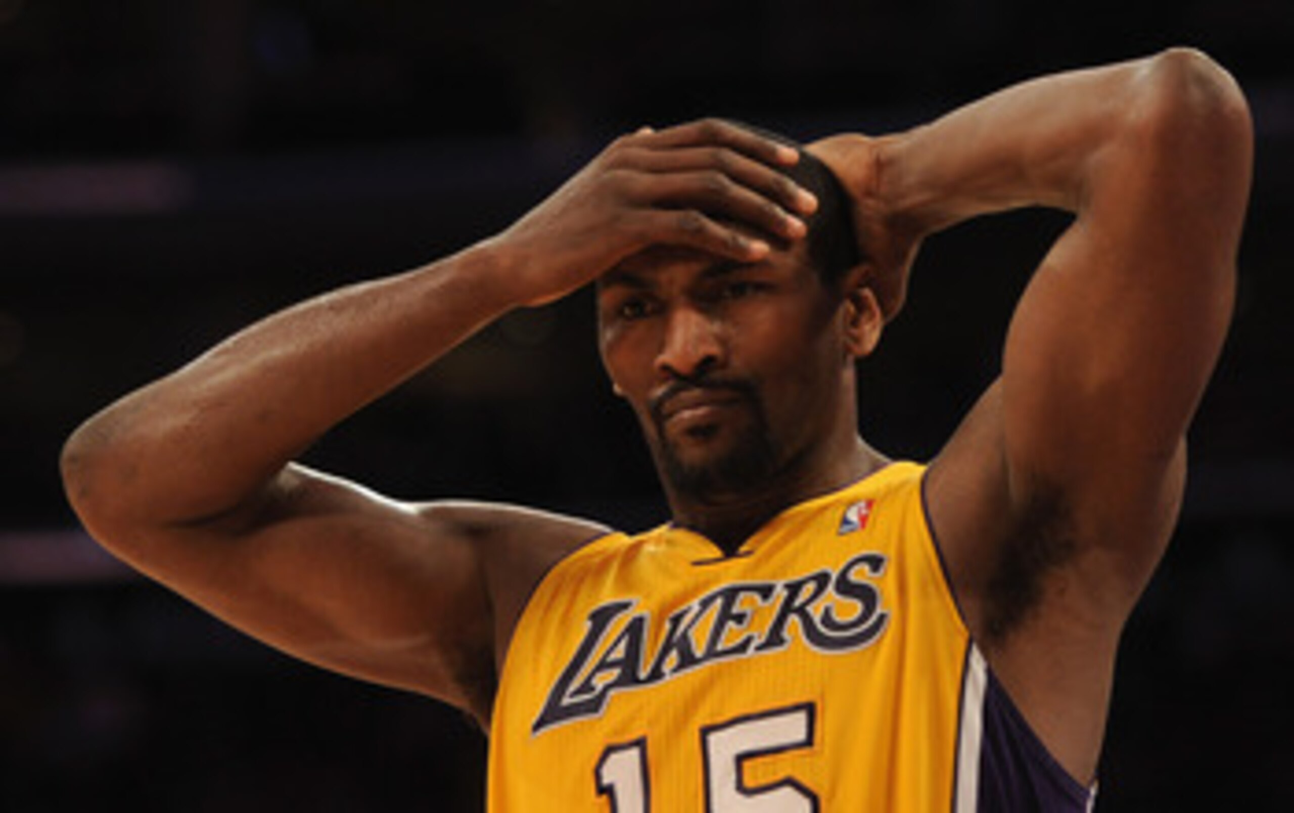 LOS ANGELES, CA - FEBRUARY 03:  Ron Artest #15 of the Los Angeles Lakers reacts on defense after a San Antonio Spurs basket during a 89-88 Spur win at Staples Center on February 3, 2011 in Los Angeles, California.  NOTE TO USER: User expressly acknowledge