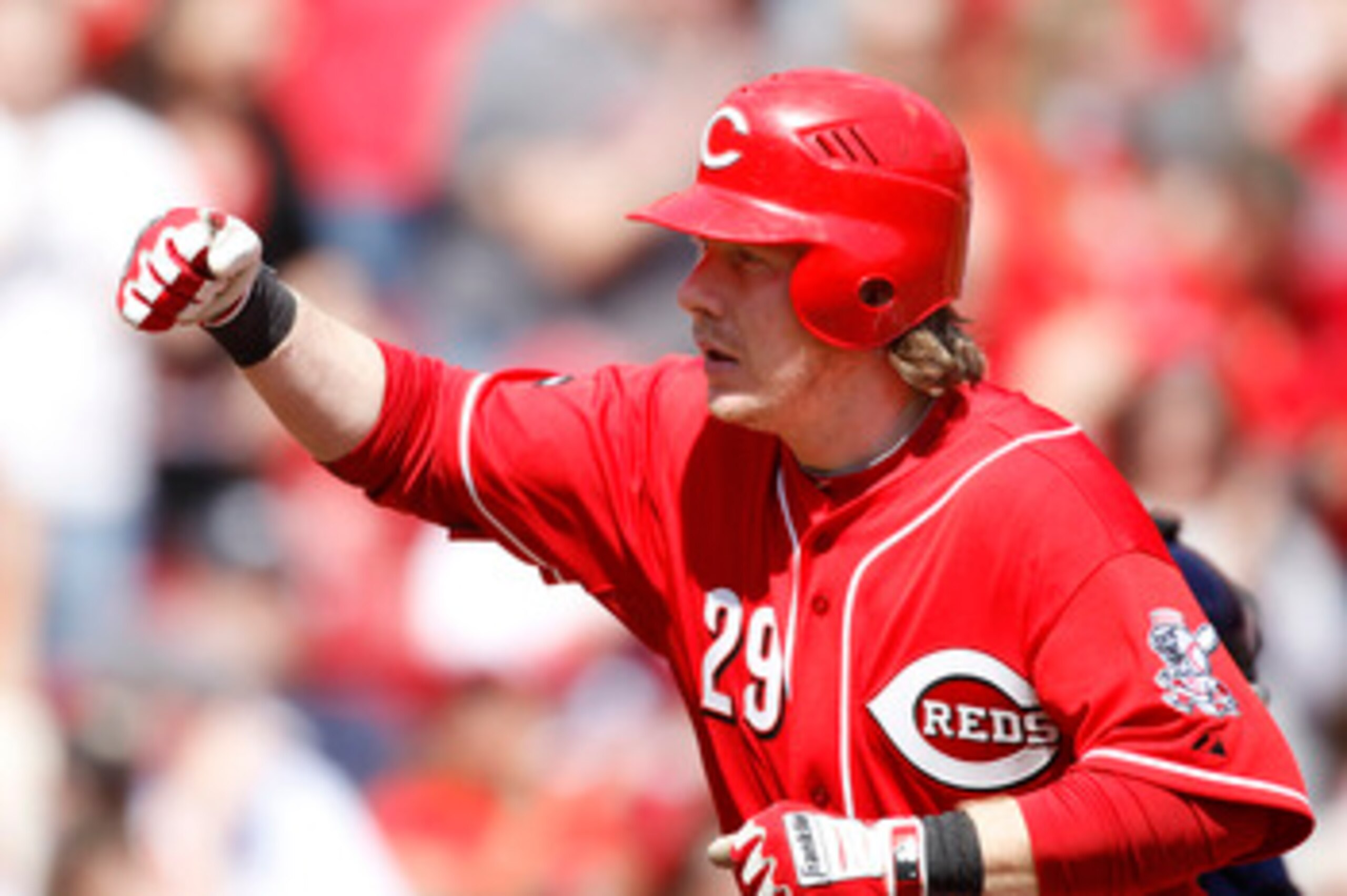 CINCINNATI, OH - APRIL 3: Ryan Hanigan #29 of the Cincinnati Reds celebrates as he rounds the bases after the first of two home runs against the Milwaukee Brewers at Great American Ball Park on April 3, 2011 in Cincinnati, Ohio. The Reds won 12-3. (Photo 