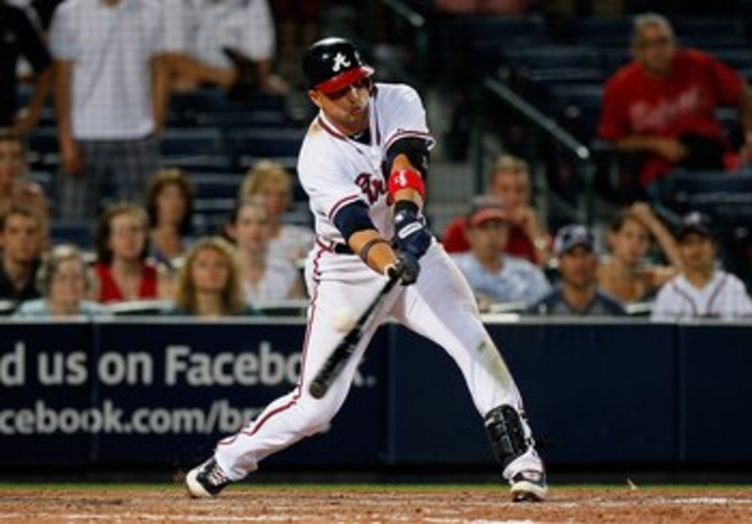 ATLANTA - MAY 14:  Martin Prado #14 of the Atlanta Braves hits a two-run single in the bottom of the ninth inning to give the Braves a 6-5 win over the Arizona Diamondbacks at Turner Field on May 14, 2010 in Atlanta, Georgia.  (Photo by Kevin C. Cox/Getty