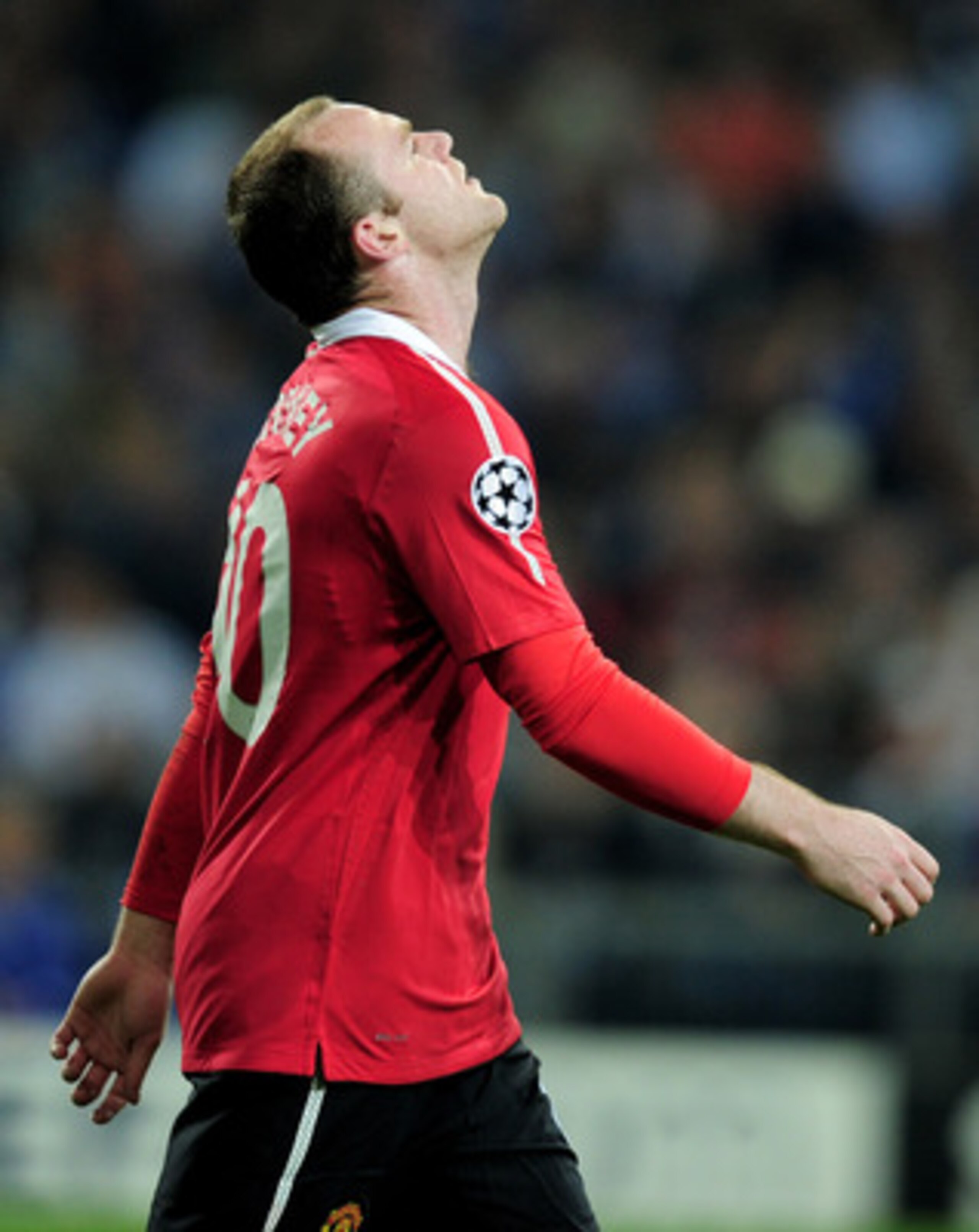 GELSENKIRCHEN, GERMANY - APRIL 26:  Wayne Rooney of Manchester United reacts during the UEFA Champions League Semi Final first leg match between FC Schalke 04 and Manchester United at Veltins Arena on April 26, 2011 in Gelsenkirchen, Germany.  (Photo by J