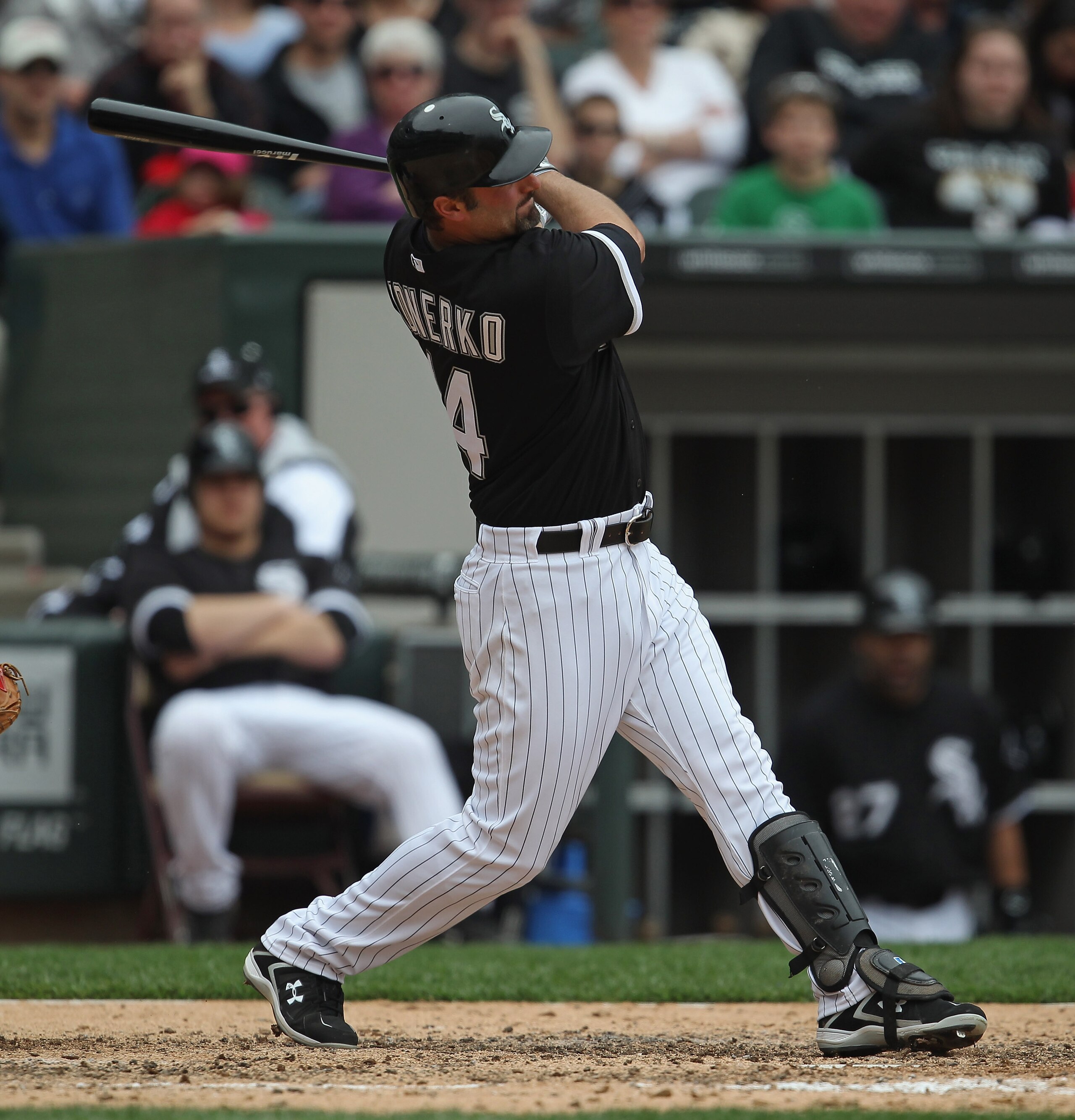CHICAGO, IL - MAY 01: Paul Konerko #14 of the Chicago White Sox hits the ball against the Baltimore Orioles at U.S. Cellular Field on May 1, 2011 in Chicago, Illinois. The Orioles defeated the White Sox 6-4. (Photo by Jonathan Daniel/Getty Images)