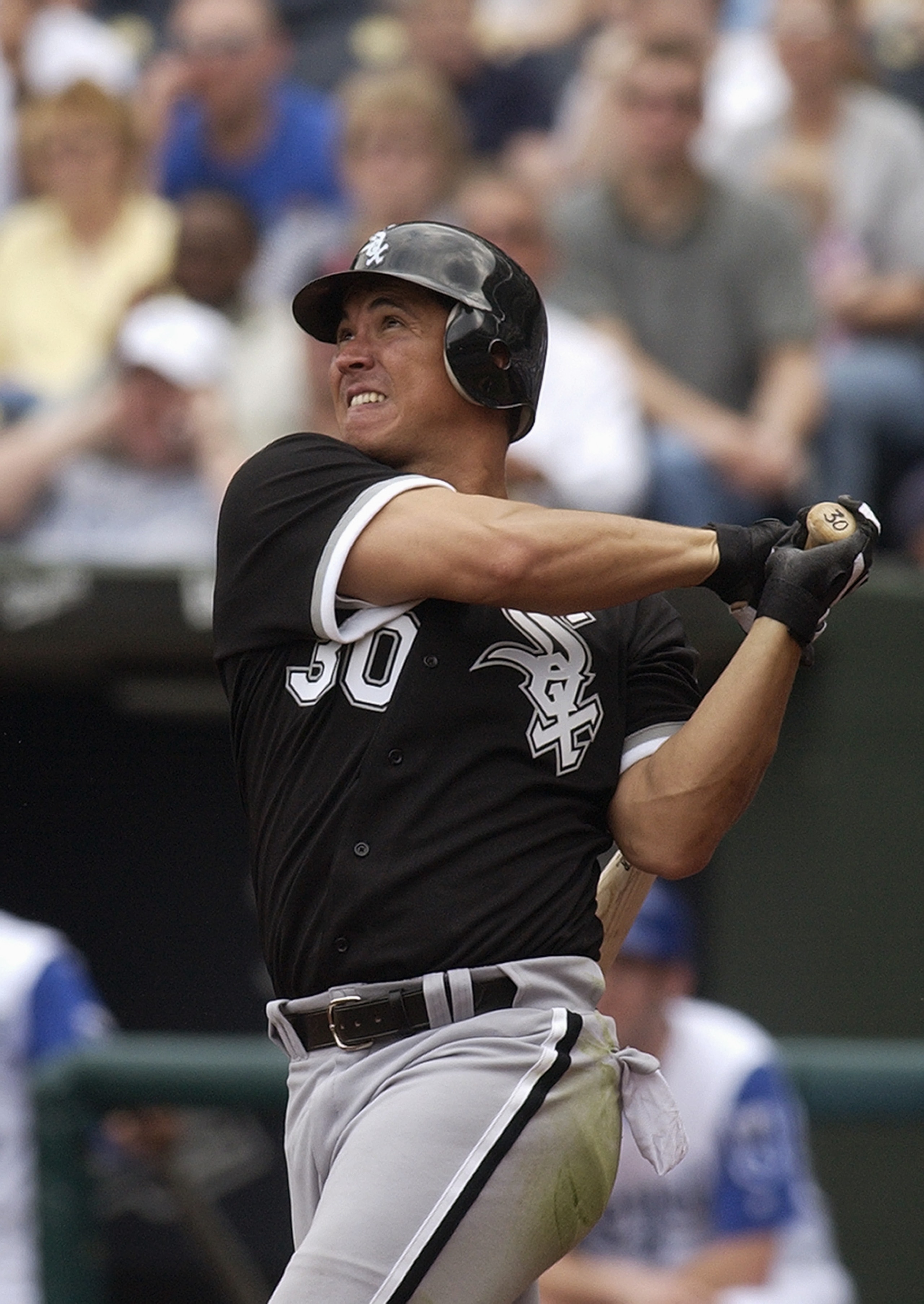 KANSAS CITY, MO - APRIL 7:  Magglio Ordonez #30 of the Chicago White Sox bats during the game against the Kansas City Royals at Kauffman Stadium on April 7, 2004 in Kansas City, Missouri. The White Sox won 4-3.  (Photo by Dave Kaup/Getty Images)