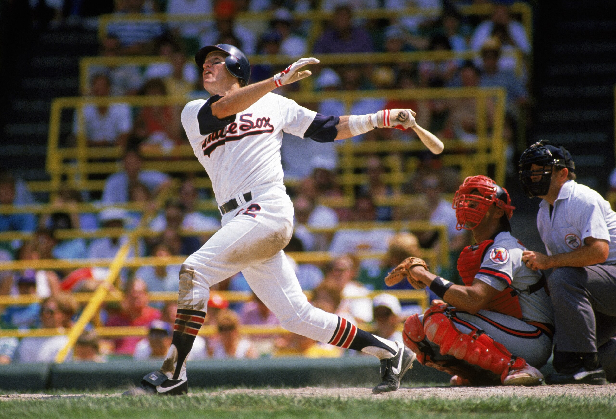 CHICAGO - 1988:  Carlton Fisk #72 of the Chicago White Sox watches the flight of his hit during a 1988 season game against the California Angels at Comiskey Park in Chicago, Illinois. (Photo by Jonathan Daniel/Getty Images)