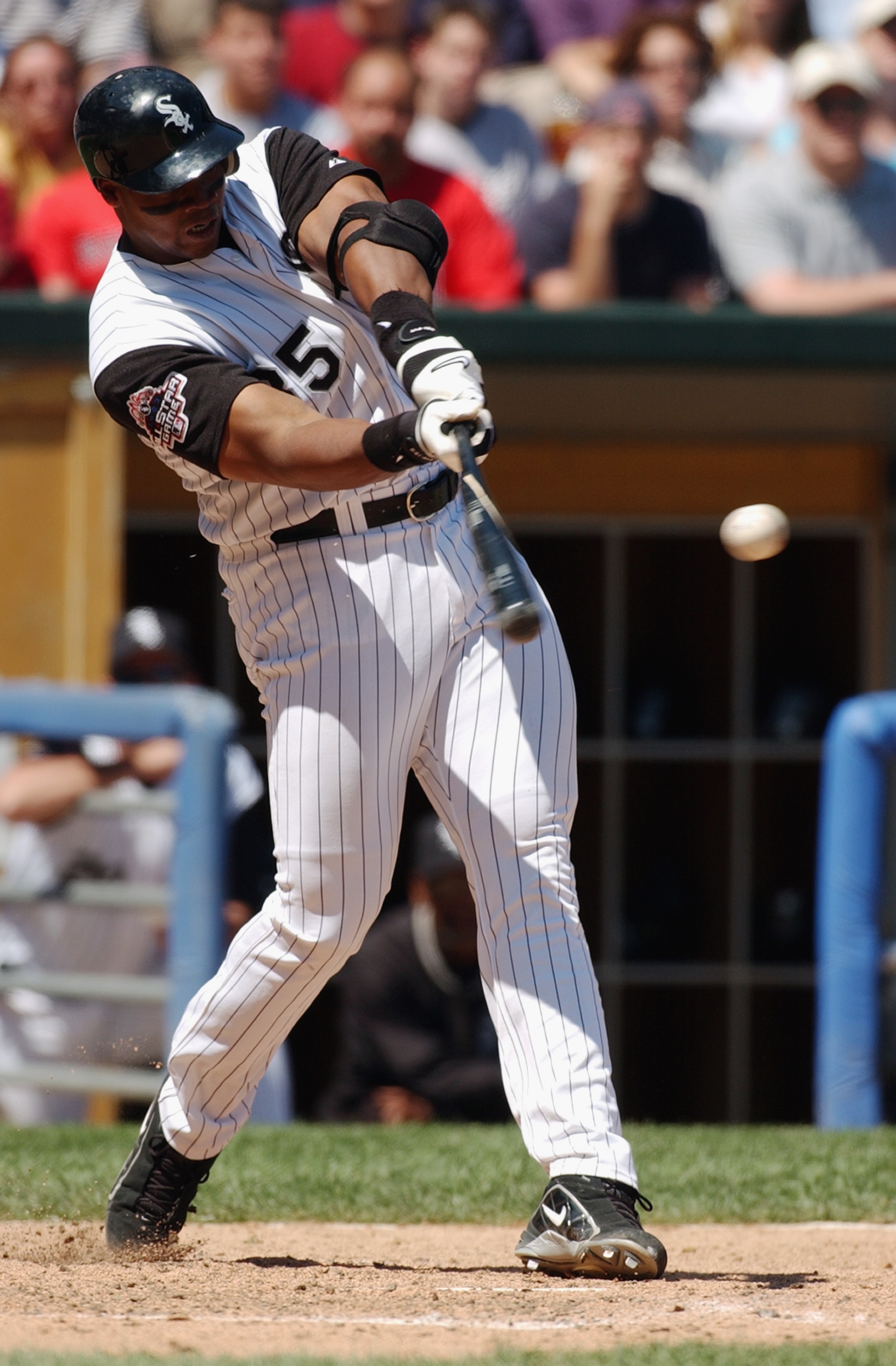 CHICAGO - JUNE 19:  First baseman Frank Thomas #35 of the Chicago White Sox connects with a Boston Red Sox pitch during the MLB game at U.S. Cellular Field on June 19, 2003 in Chicago, Illinois. The Red Sox defeated the White Sox 4-3 in 10 innings. (Photo
