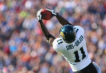 ORCHARD PARK, NY - OCTOBER 10:  Mike Sims-Walker #11 of the Jacksonville Jaguars makes a catch against the Buffalo Bills   at Ralph Wilson Stadium on October 10, 2010 in Orchard Park, New York. Jacksonville won 36-26. (Photo by Rick Stewart/Getty Images)