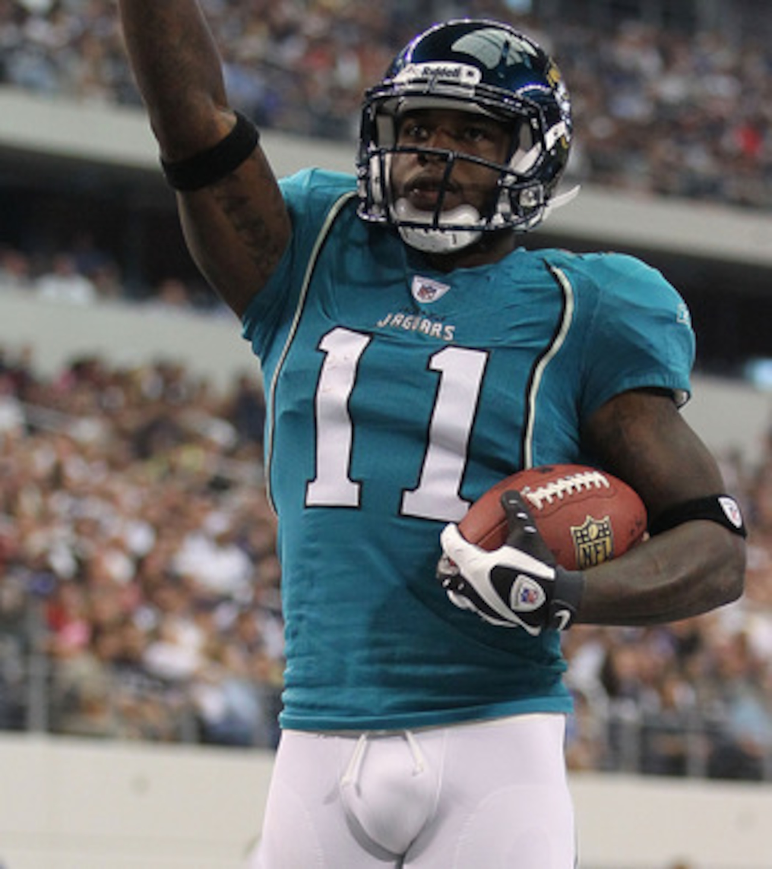 ARLINGTON, TX - OCTOBER 31: Wide receiver Mike Sims-Walker #11 of the Jacksonville Jaguars celebrates a touchdown against the Dallas Cowboys in the first quarter at Cowboys Stadium on October 31, 2010 in Arlington, Texas. (Photo by Ronald Martinez/Getty ARLINGTON, TX - OCTOBER 31: Wide receiver Mike Sims-Walker #11 of the Jacksonville Jaguars celebrates a touchdown against the Dallas Cowboys in the first quarter at Cowboys Stadium on October 31, 2010 in Arlington, Texas. (Photo by Ronald Martinez/Getty