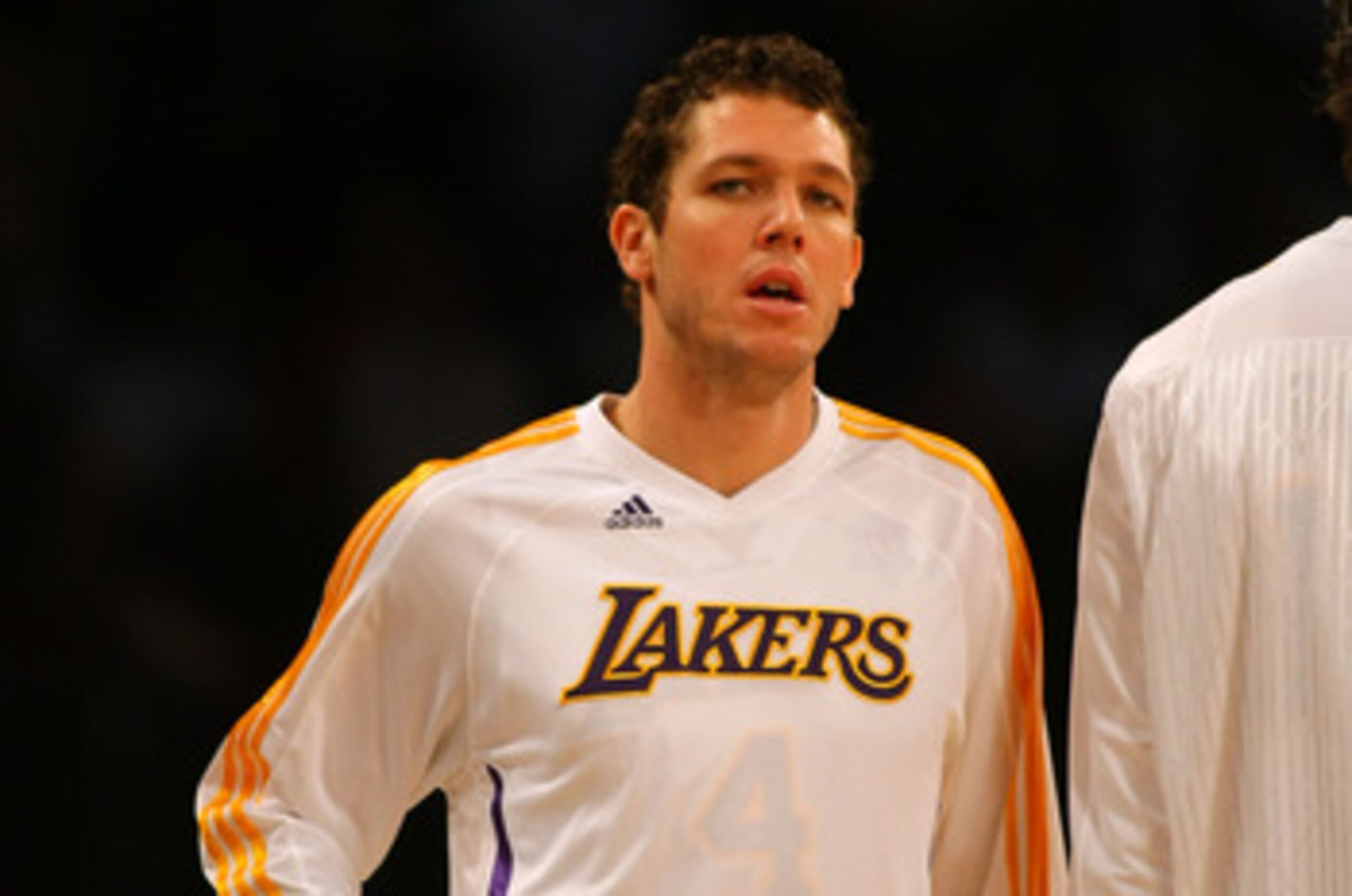 LOS ANGELES, CA - DECEMBER 25:  Luke Walton #4 of the Los Angeles Lakers warms up prior to their NBA game against the Miami Heat at Staples Center on December 25, 2010 in Los Angeles, California. The Heat defeated the Lakers 96-80. NOTE TO USER: User expr