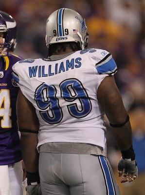 MINNEAPOLIS - SEPTEMBER 26:  Brett Favre #4 of the Minnesota Vikings and Corey Williams # 99 of the Detroit Lions share a laugh during the second half at Hubert H. Humphrey Metrodome on September 26, 2010 in Minneapolis, Minnesota. The Vikings defeated th