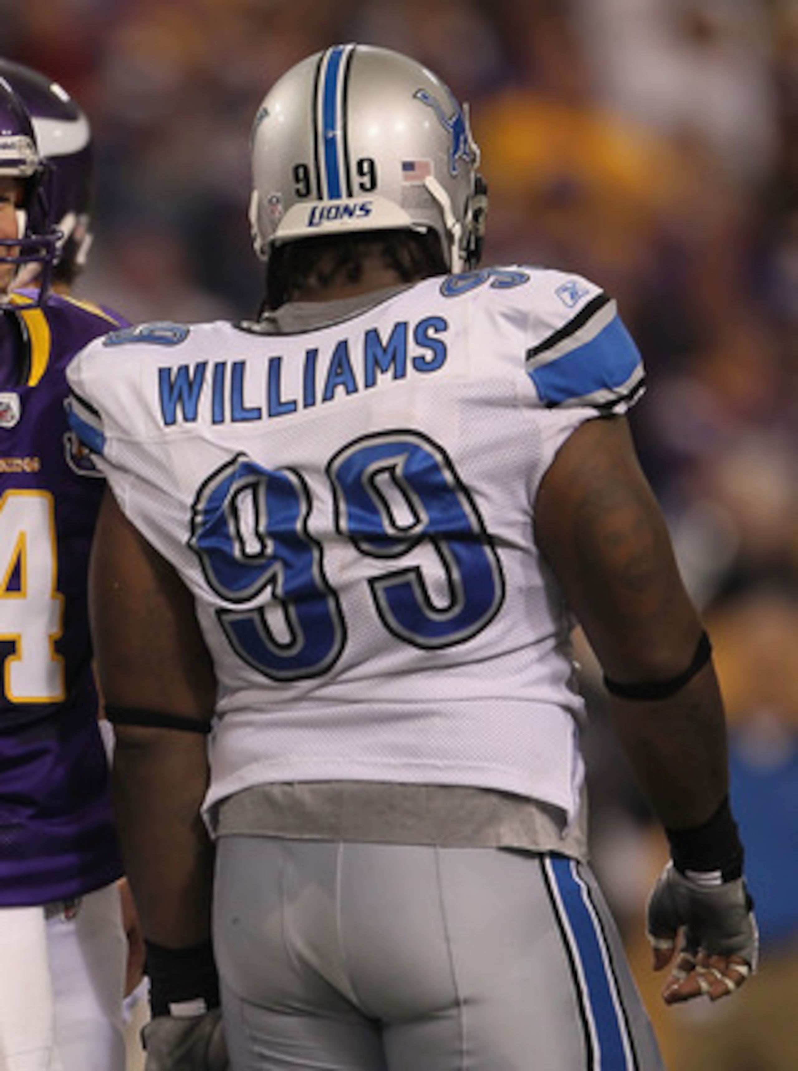 MINNEAPOLIS - SEPTEMBER 26:  Brett Favre #4 of the Minnesota Vikings and Corey Williams # 99 of the Detroit Lions share a laugh during the second half at Hubert H. Humphrey Metrodome on September 26, 2010 in Minneapolis, Minnesota. The Vikings defeated th