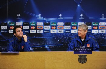 BARCELONA, SPAIN - MARCH 07:  Arsene Wenger (R), Manager of Arsenal sits besides player Cesc Fabregas during a press conference ahead of their UEFA Champions League round of 16 second leg match against Barcelona at the Camp Nou stadium on March 7, 2011 in