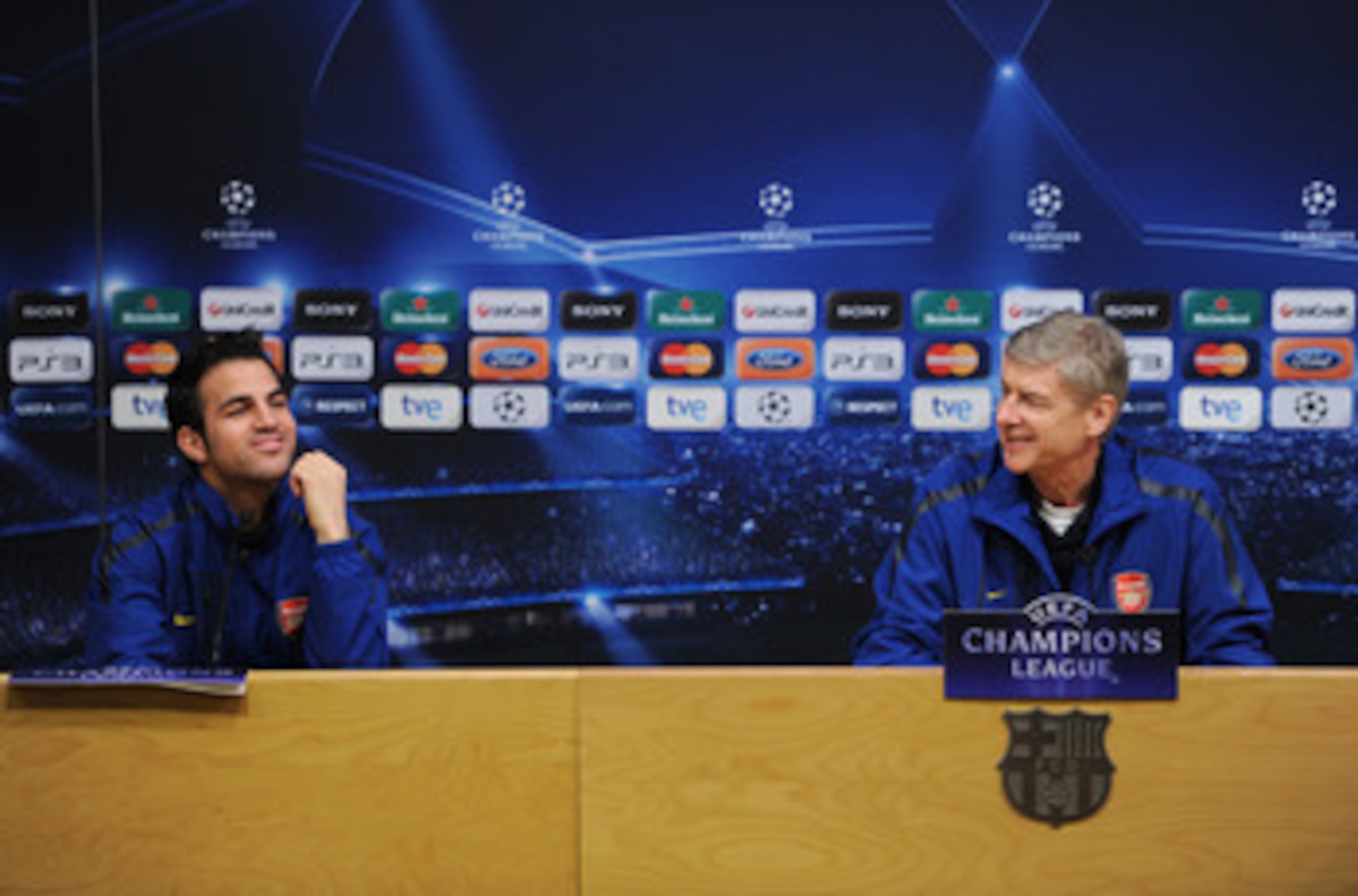BARCELONA, SPAIN - MARCH 07:  Arsene Wenger (R), Manager of Arsenal sits besides player Cesc Fabregas during a press conference ahead of their UEFA Champions League round of 16 second leg match against Barcelona at the Camp Nou stadium on March 7, 2011 in