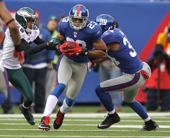 EAST RUTHERFORD, NJ - DECEMBER 19:  Corey Webster #23 of the New York Giants intercepts the ball during their game against the Philadelphia Eagles on December 19, 2010 at The New Meadowlands Stadium in East Rutherford, New Jersey.  (Photo by Al Bello/Gett
