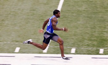 INDIANAPOLIS, IN - MARCH 1: Defensive back Aaron Williams #53 runs the 40-yard dash during the 2011 NFL Scouting Combine at Lucas Oil Stadium on February 28, 2011 in Indianapolis, Indiana. (Photo by Joe Robbins/Getty Images)