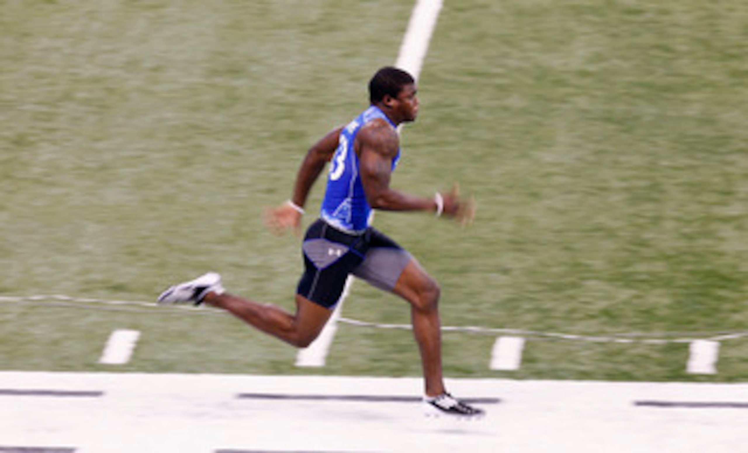 INDIANAPOLIS, IN - MARCH 1: Defensive back Aaron Williams #53 runs the 40-yard dash during the 2011 NFL Scouting Combine at Lucas Oil Stadium on February 28, 2011 in Indianapolis, Indiana. (Photo by Joe Robbins/Getty Images) INDIANAPOLIS, IN - MARCH 1: Defensive back Aaron Williams #53 runs the 40-yard dash during the 2011 NFL Scouting Combine at Lucas Oil Stadium on February 28, 2011 in Indianapolis, Indiana. (Photo by Joe Robbins/Getty Images)