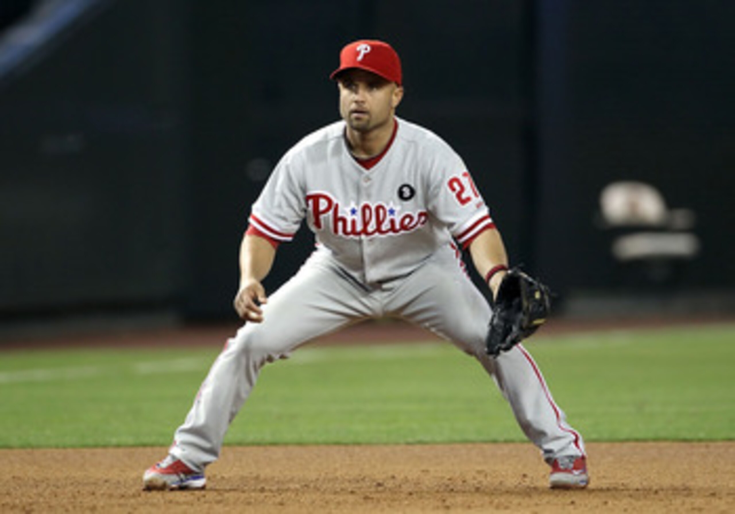 PHOENIX, AZ - APRIL 25:  Infielder Placido Polanco #27 of the Philadelphia Phillies in action during the Major League Baseball game against the Arizona Diamondbacks at Chase Field on April 25, 2011 in Phoenix, Arizona.  The Diamondbacks defeated the Phill