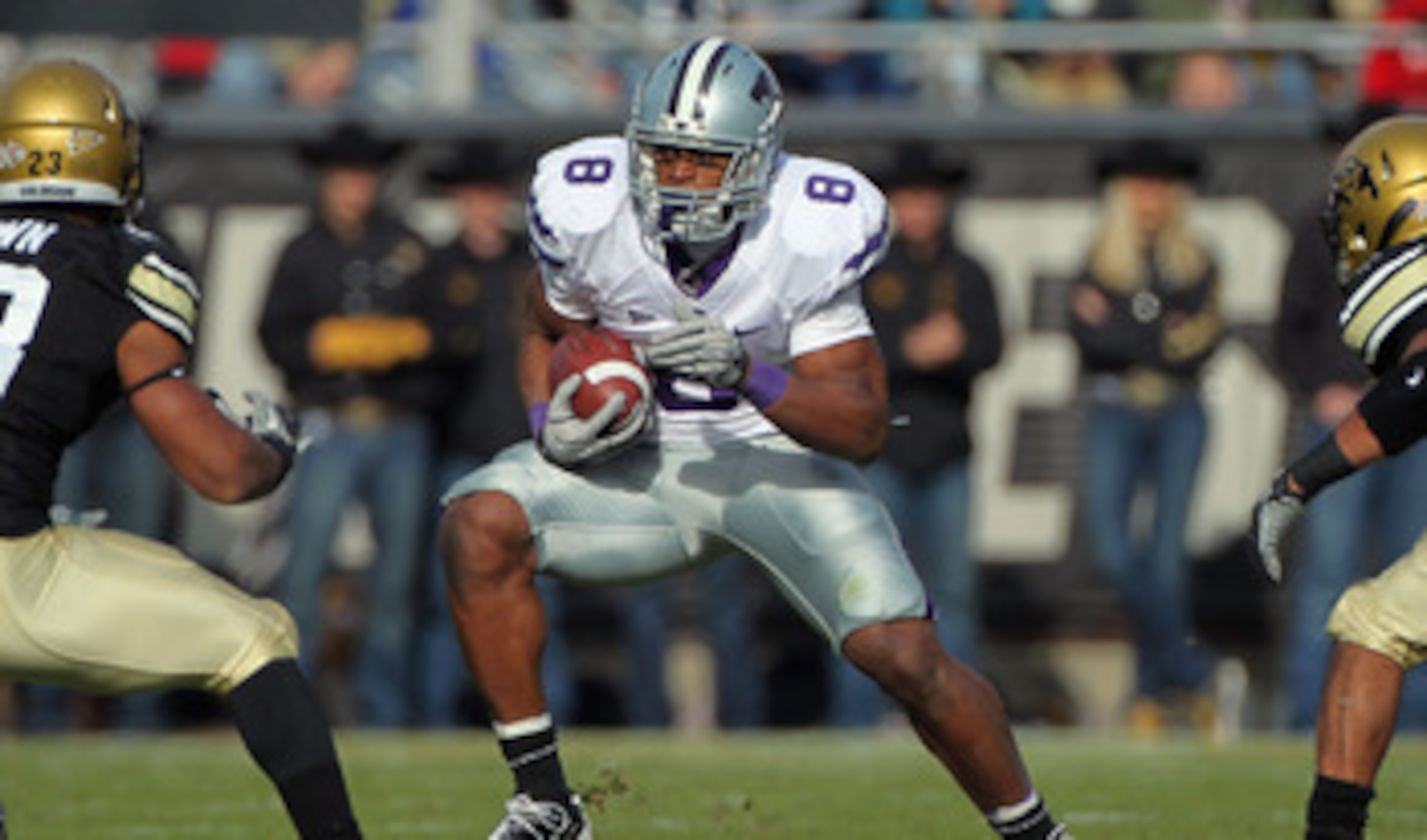 BOULDER, CO - NOVEMBER 20: Daniel Thomas #8 of the Kansas State Wildcats rushes with the ball against the Colorado Buffaloes at Folsom Field on November 20, 2010 in Boulder, Colorado. Colorado defeated Kansas State 44-36. (Photo by Doug Pensinger/Getty BOULDER, CO - NOVEMBER 20: Daniel Thomas #8 of the Kansas State Wildcats rushes with the ball against the Colorado Buffaloes at Folsom Field on November 20, 2010 in Boulder, Colorado. Colorado defeated Kansas State 44-36. (Photo by Doug Pensinger/Getty