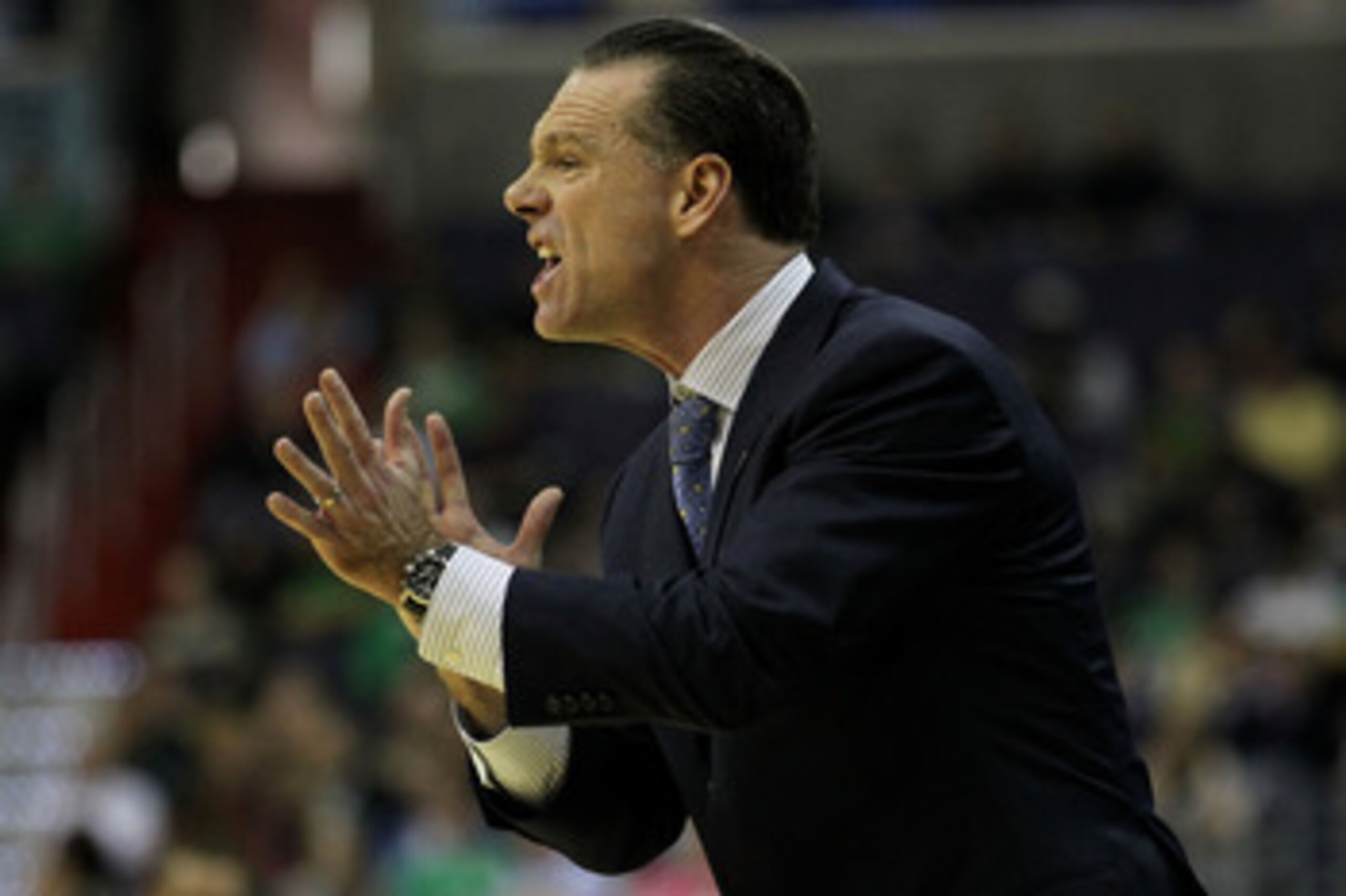 WASHINGTON - MARCH 17:  Head coach of the Pittsburgh Panthers Jamie Dixon, shouts from the bench during their game against the North Carolina-Asheville Bulldogs during the second round of the 2011 NCAA men's basketball tournament at the Verizon Center on 