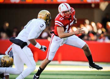 LINCOLN, NE - NOVEMBER 26: Cody Green #17 of the Nebraska Cornhuskers slips past Jimmy Smith #3 of the Colorado Buffaloes during their game at Memorial Stadium on November 26, 2010 in Lincoln, Nebraska. Nebraska defeated Colorado 45-17 (Photo by Eric Fran