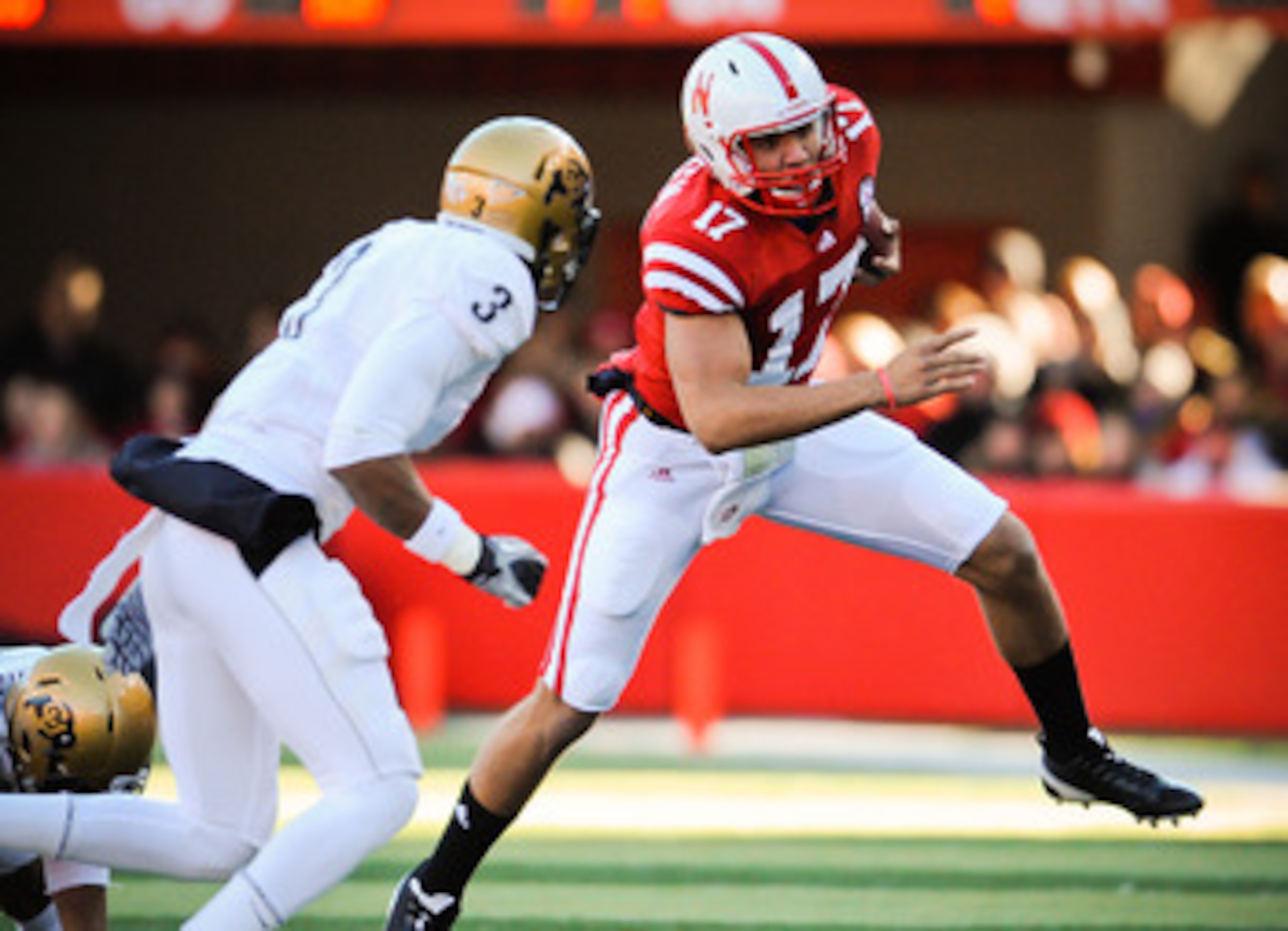 LINCOLN, NE - NOVEMBER 26: Cody Green #17 of the Nebraska Cornhuskers slips past Jimmy Smith #3 of the Colorado Buffaloes during their game at Memorial Stadium on November 26, 2010 in Lincoln, Nebraska. Nebraska defeated Colorado 45-17 (Photo by Eric Fran LINCOLN, NE - NOVEMBER 26: Cody Green #17 of the Nebraska Cornhuskers slips past Jimmy Smith #3 of the Colorado Buffaloes during their game at Memorial Stadium on November 26, 2010 in Lincoln, Nebraska. Nebraska defeated Colorado 45-17 (Photo by Eric Fran